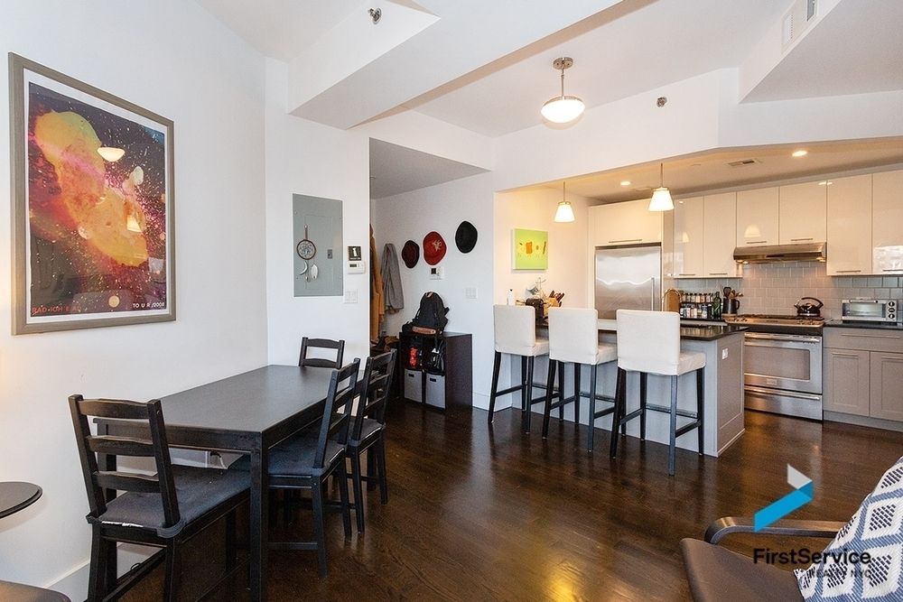 341 Eastern Parkway, Unit 5A Brooklyn, NY 11216 - Photo 4 of 10 a view of a dining room with furniture kitchen and wooden floor