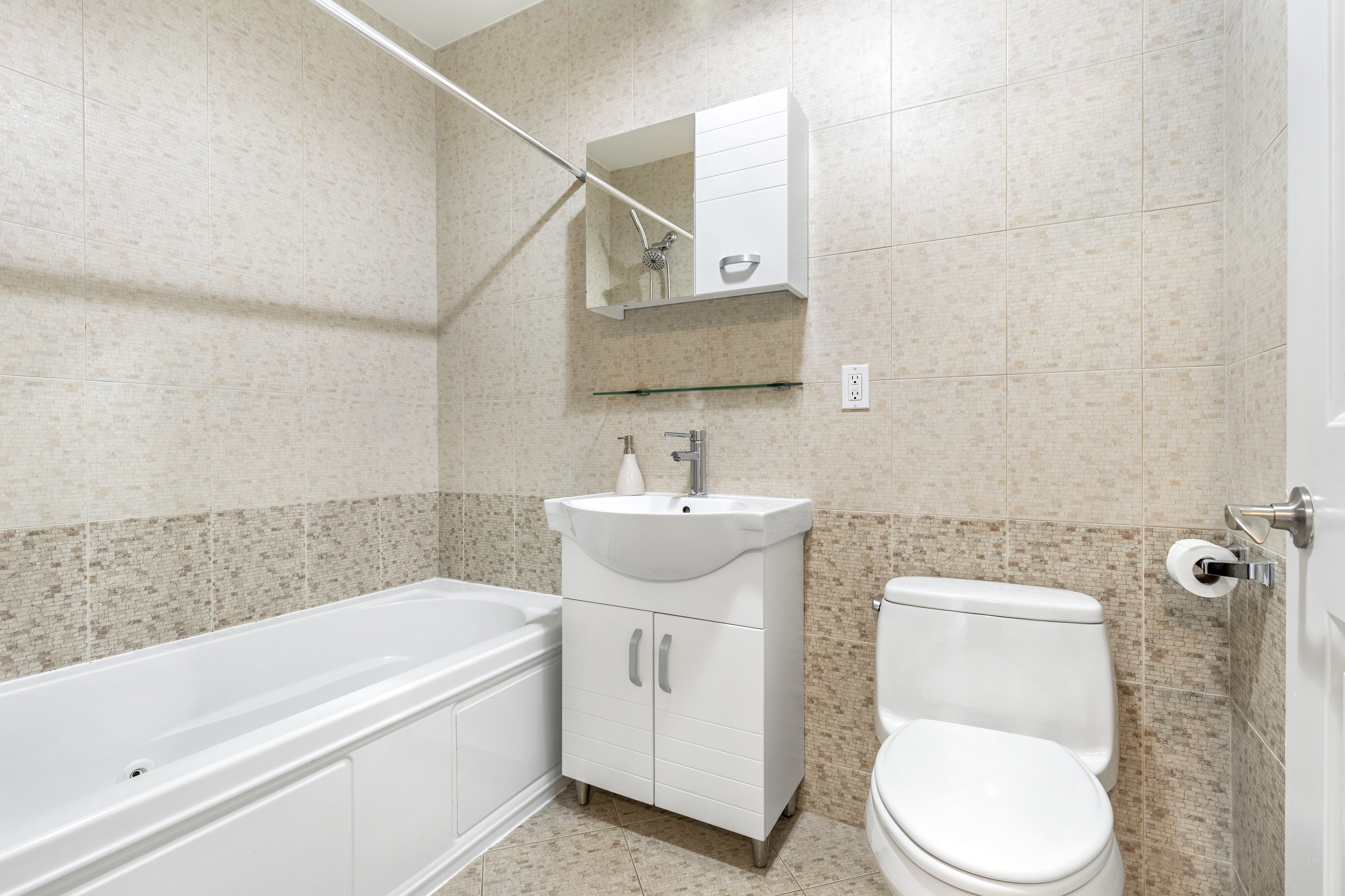 226 16th Street, Unit 5 Brooklyn, NY 11215 - Photo 6 of 13 a bathroom with a toilet sink and bathtub