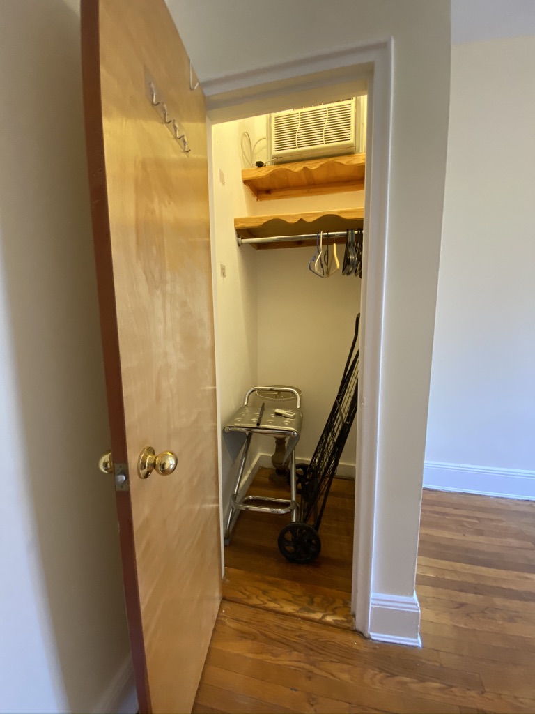 619 9th Avenue, Unit 3E Manhattan, NY 10036 - Photo 5 of 22 a view of a livingroom with a staircase