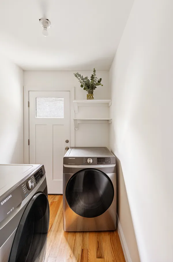 a view of a livingroom with gym equipment
