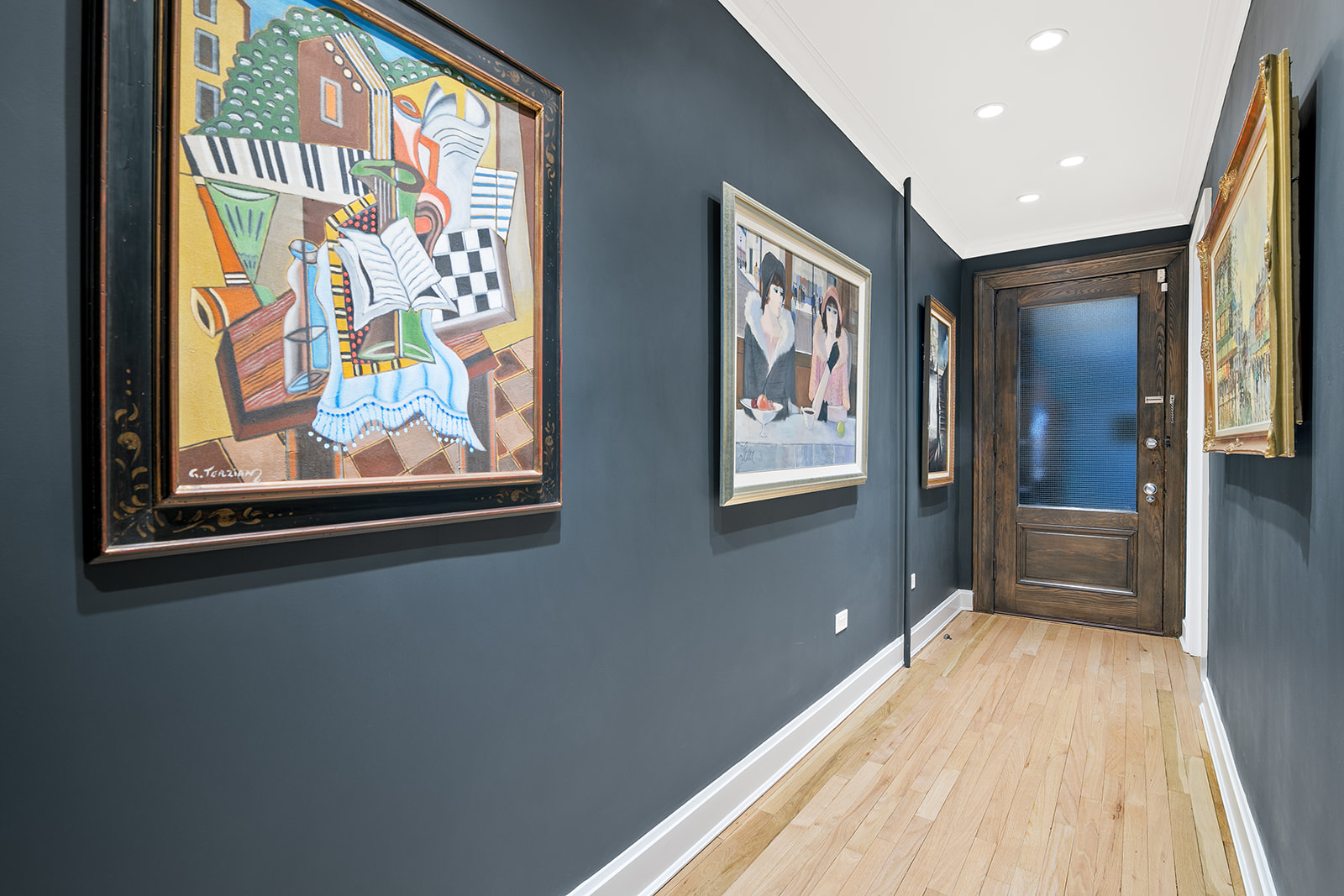 24 West 70th Street, Unit 1 Manhattan, NY 10023 - Photo 7 of 15 a view of a hallway with wooden floor and cabinet