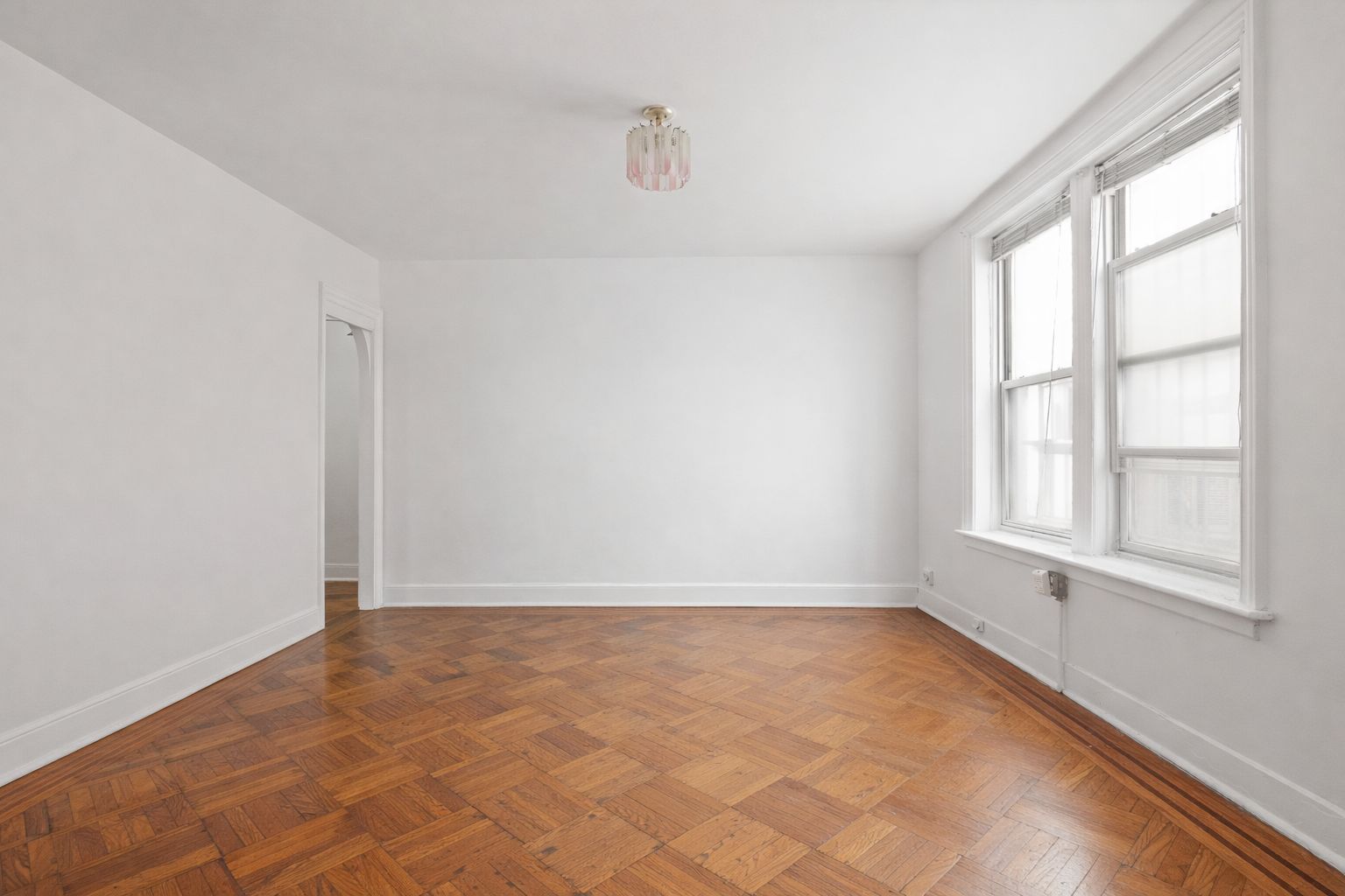 742 44th Street Brooklyn, NY 11220 - Photo 14 of 23 an empty room with a empty space and windows