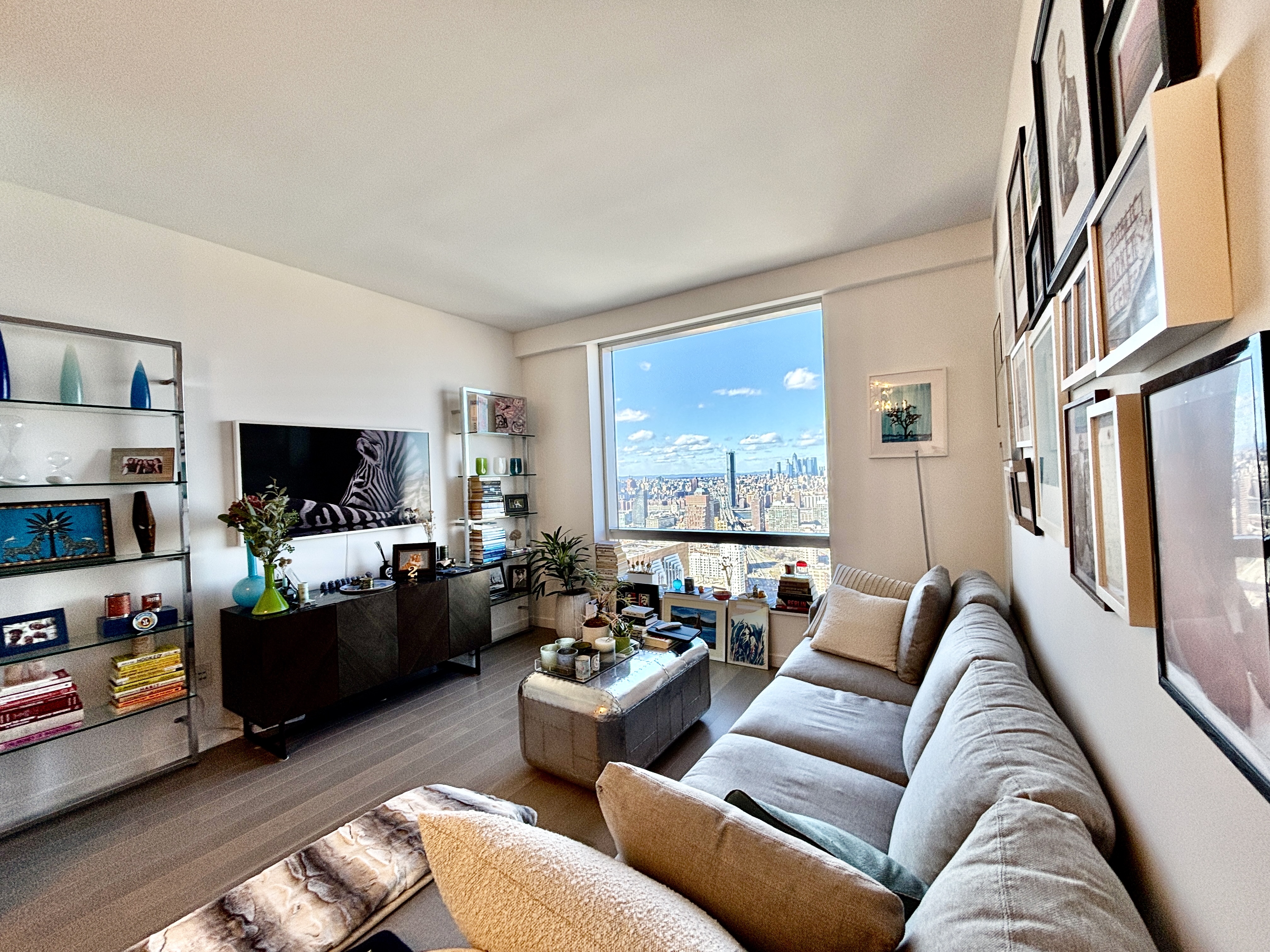 1 City Point, Unit 50B Brooklyn, NY 11201 - Photo 4 of 29 a living room with furniture and a flat screen tv