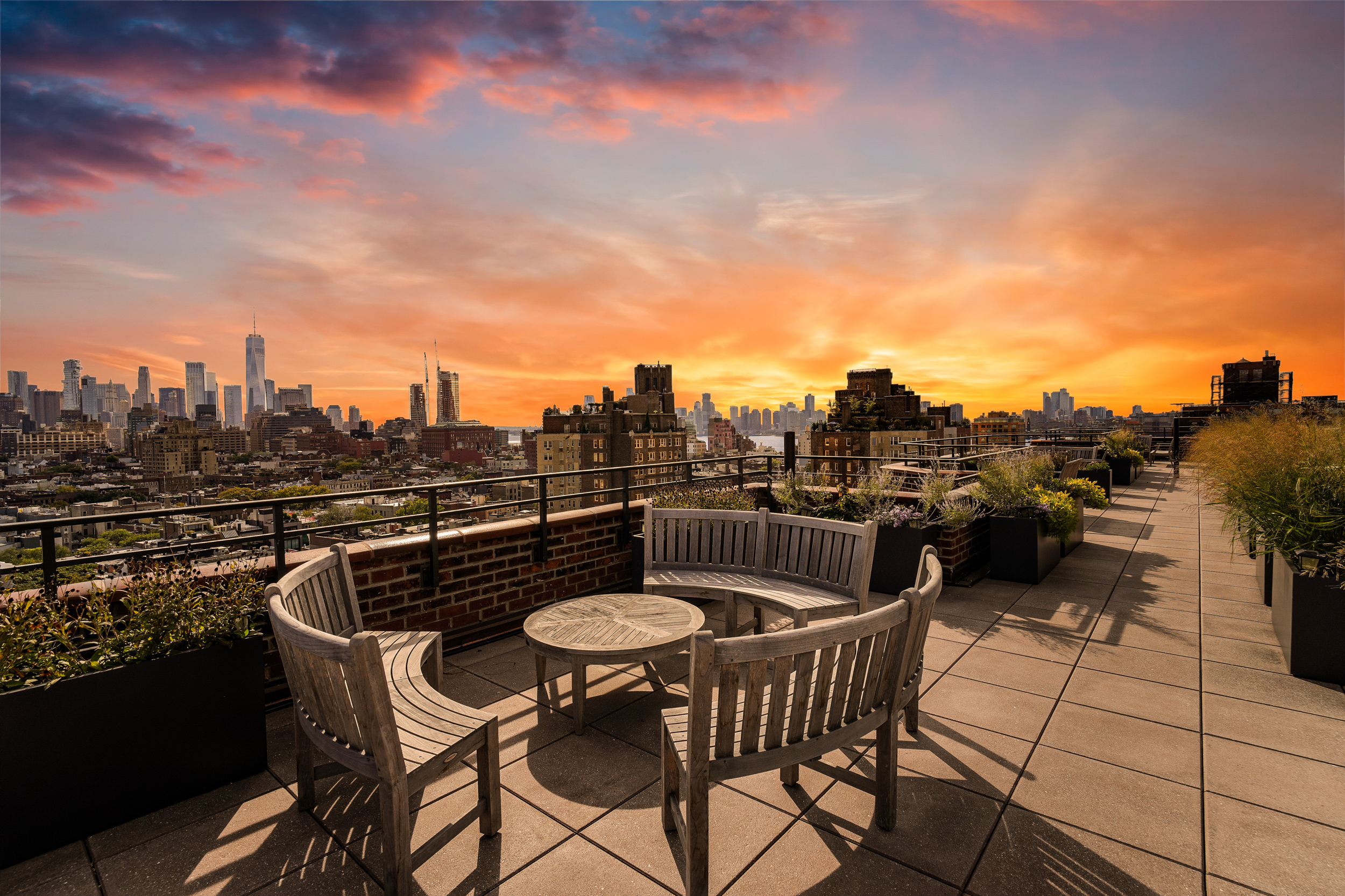 31 Jane Street, Unit 10FG Manhattan, NY 10014 - Photo 24 of 27 a terrace with outdoor seating and city view