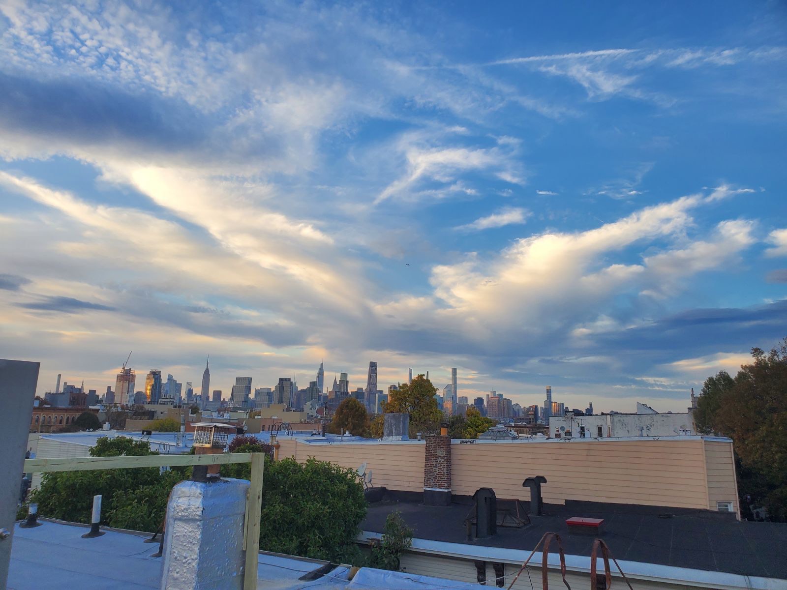 142 Driggs Avenue, Unit 3 Brooklyn, NY 11222 - Photo 6 of 8 a view of a city with lots of car parked