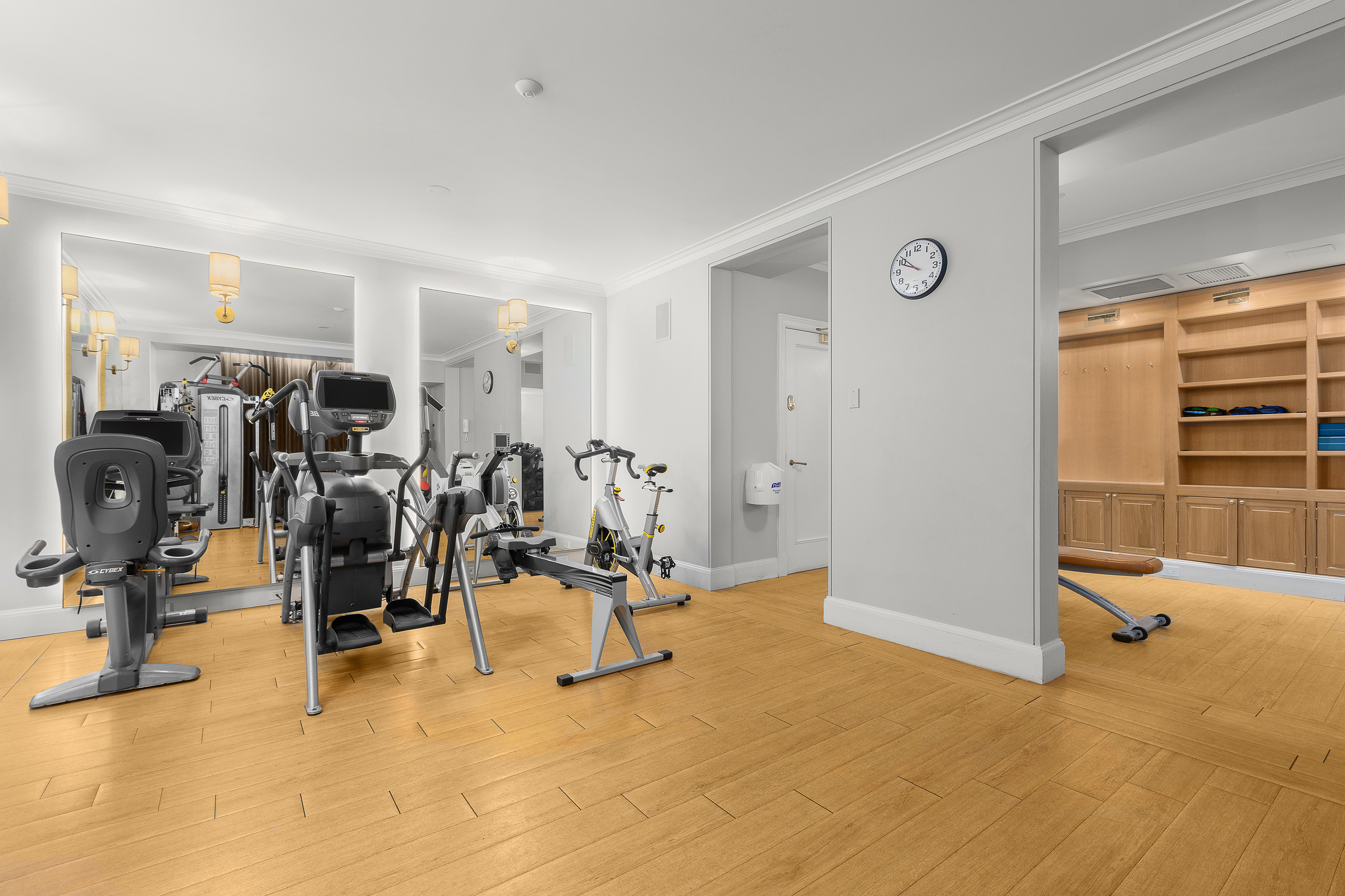 1088 Park Avenue, Unit 15C Manhattan, NY 10128 - Photo 24 of 26 a view of a room with gym equipment