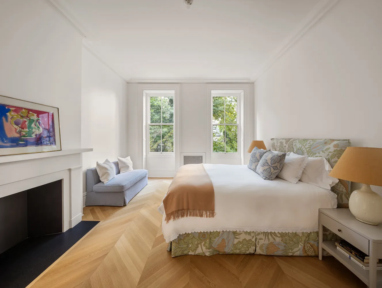 a bedroom with a bed and a couch