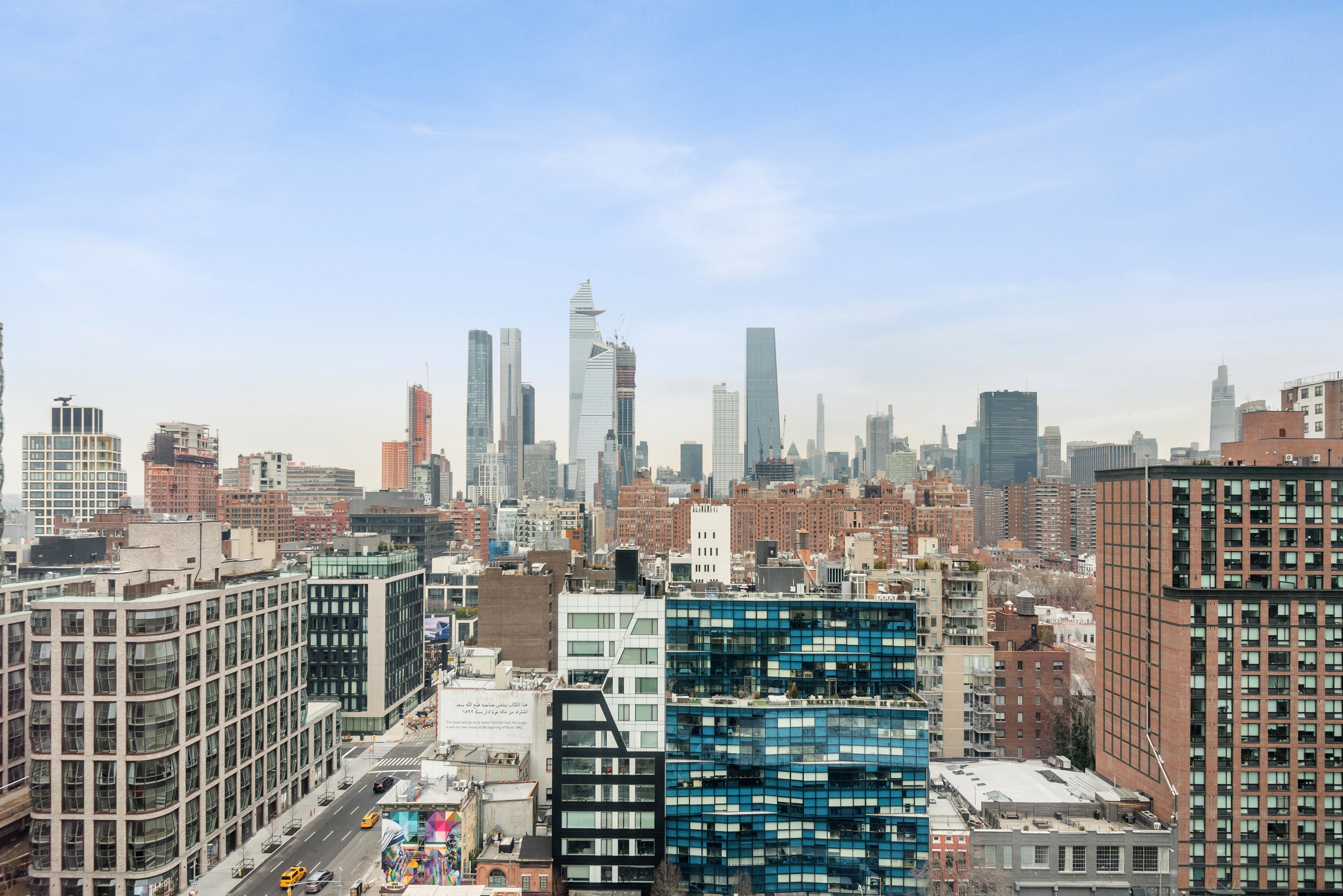 450 West 17th Street, Unit 1811 Manhattan, NY 10011 - Photo 5 of 14 a city view with tall buildings