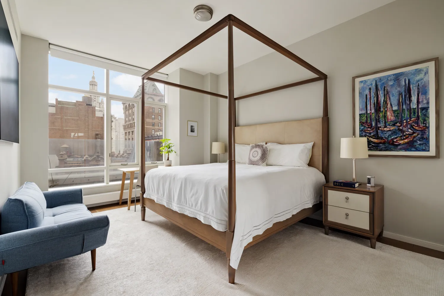 a large white kitchen with a large window