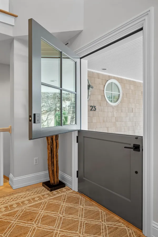 a view of a door with a chair