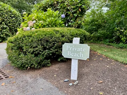 a sign on the side of the road