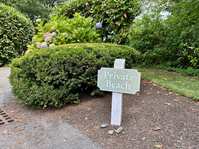 11 Juniper Circle Brewster, MA 02631 - Photo 19 of 29 a sign on the side of the road