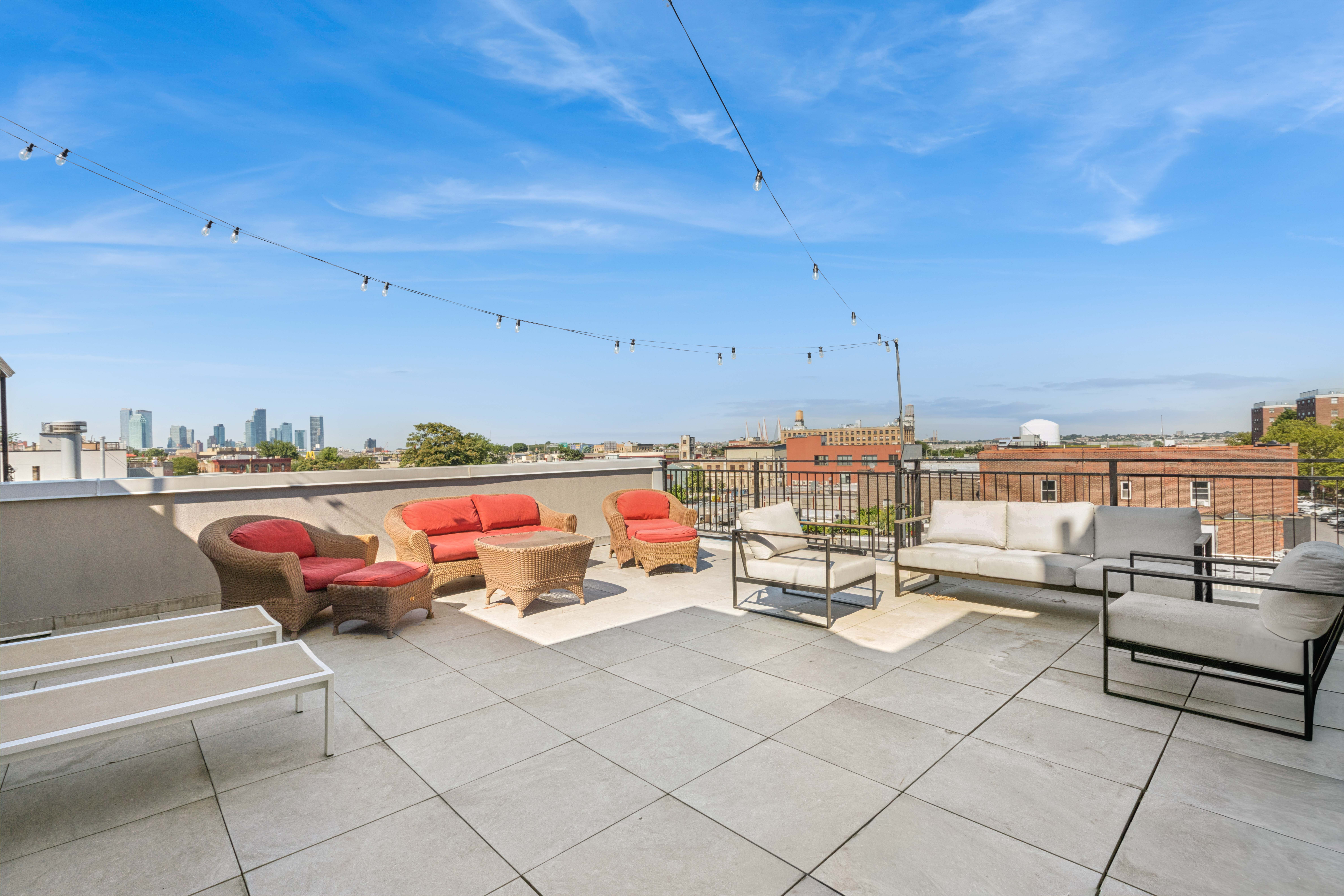 77 Kingsland Avenue, Unit 4F Brooklyn, NY 11211 - Photo 12 of 14 a outdoor view with a sitting space