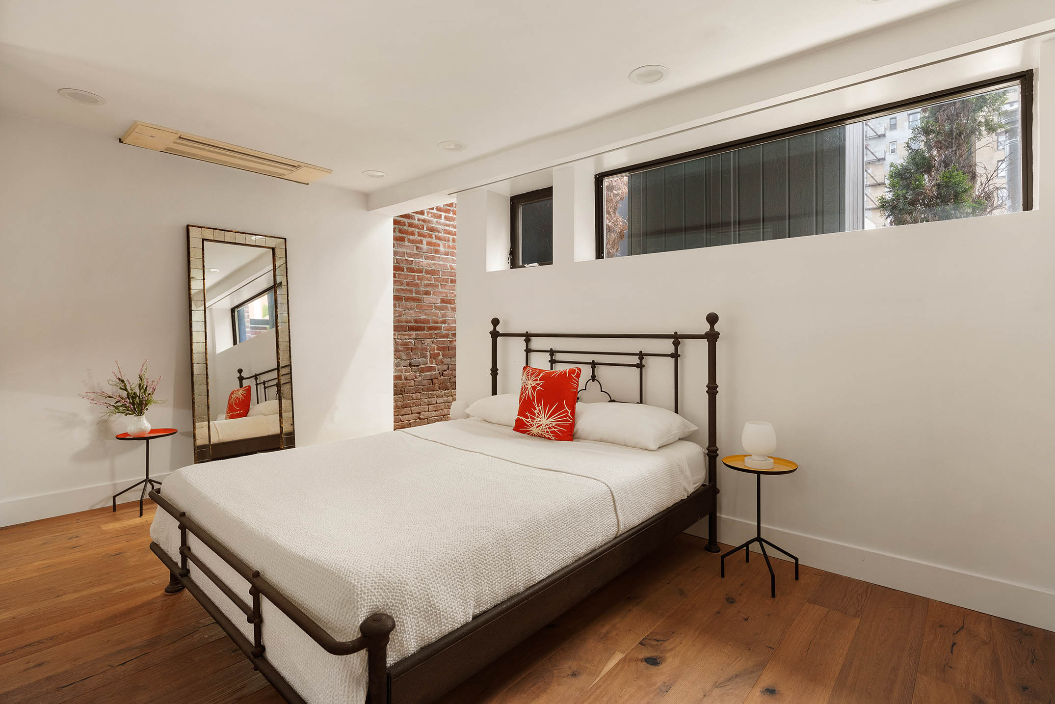 151 West 80th Street, Unit 5R Manhattan, NY 10024 - Photo 6 of 10 a bedroom with a bed and wooden floor