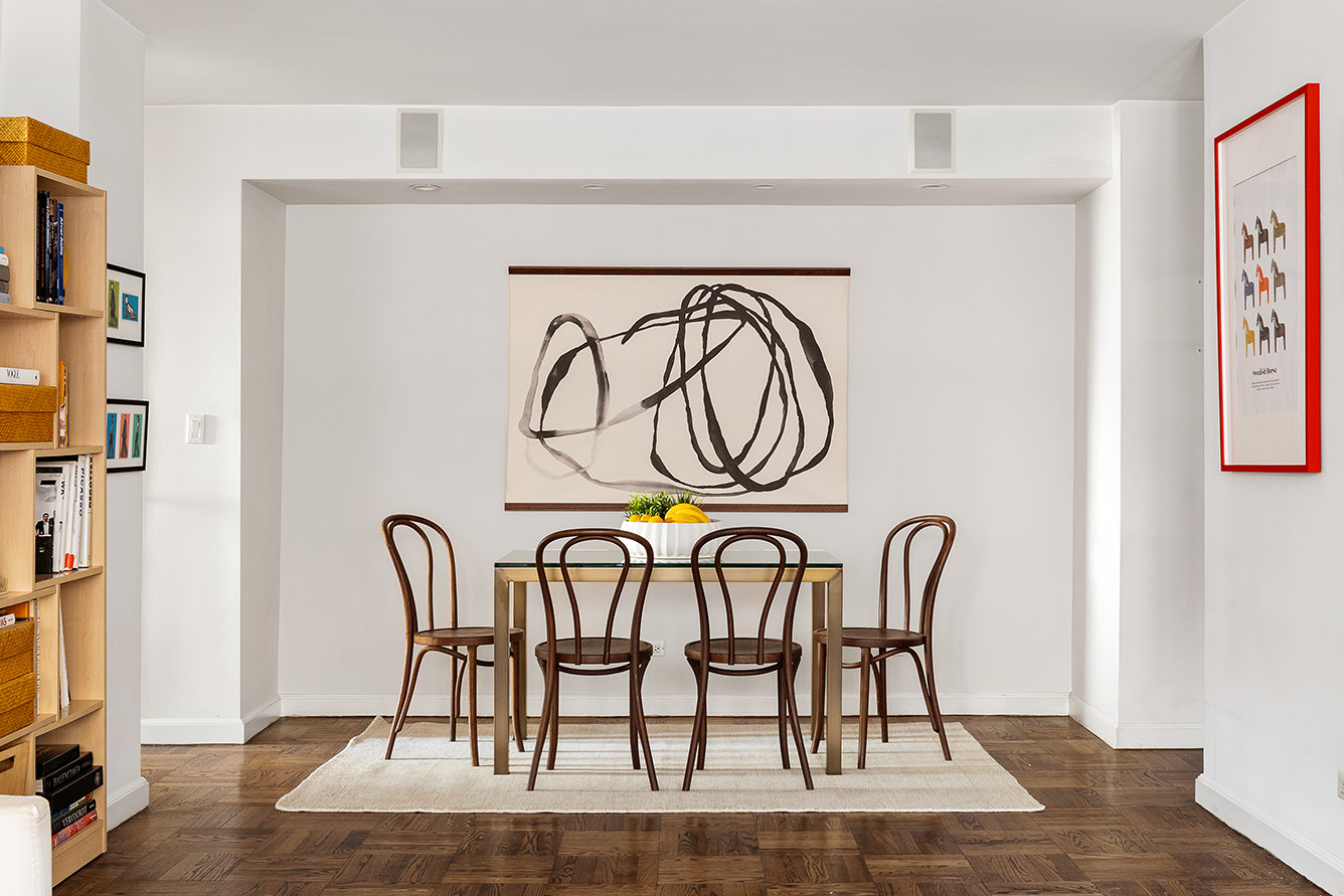 39 Gramercy Park North, Unit 9A Manhattan, NY 10010 - Photo 4 of 10 a view of a dining room with furniture and a kitchen floor