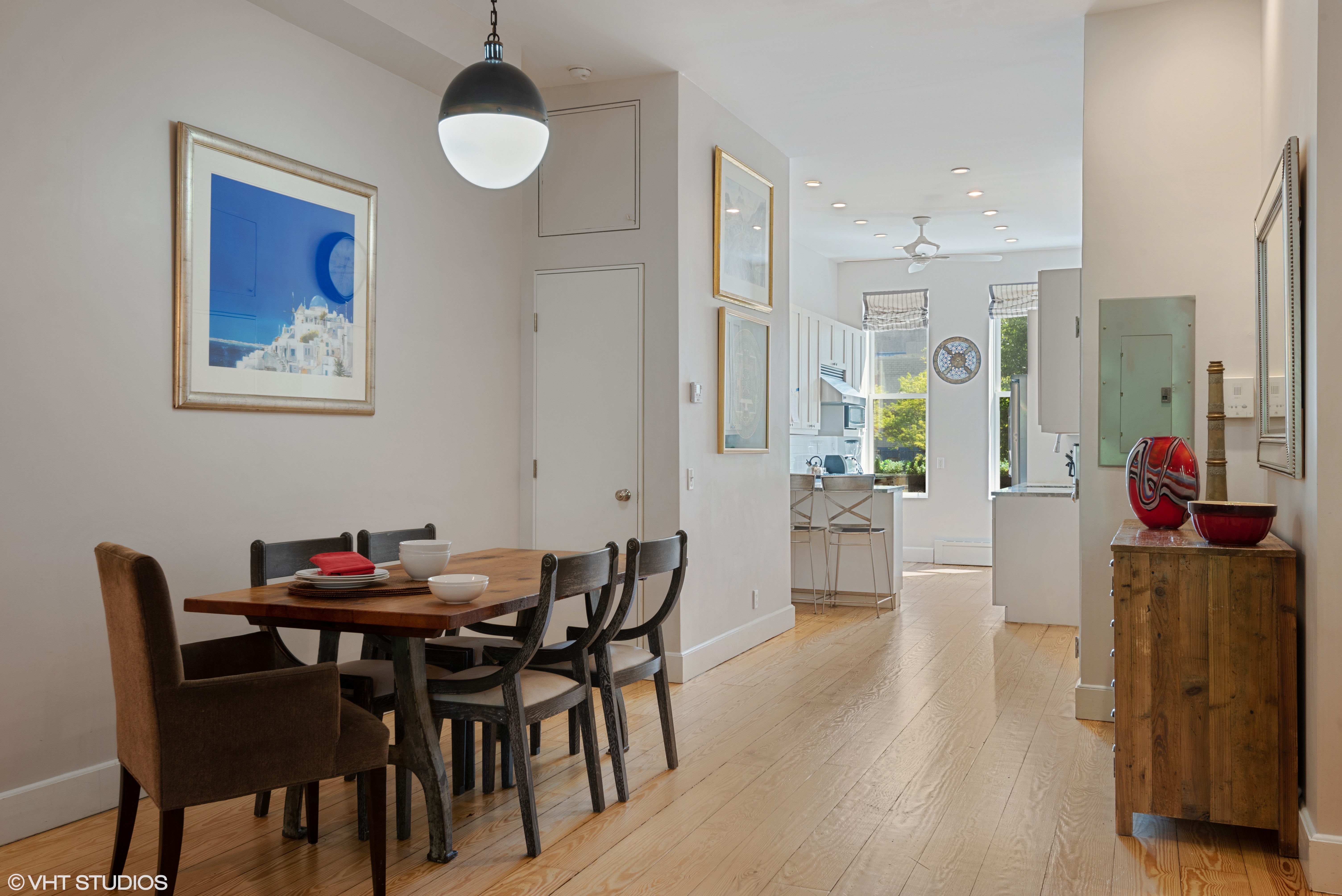 353 West 120th Street, Unit 1 Manhattan, NY 10027 - Photo 3 of 8 a dining room with furniture and wooden floor