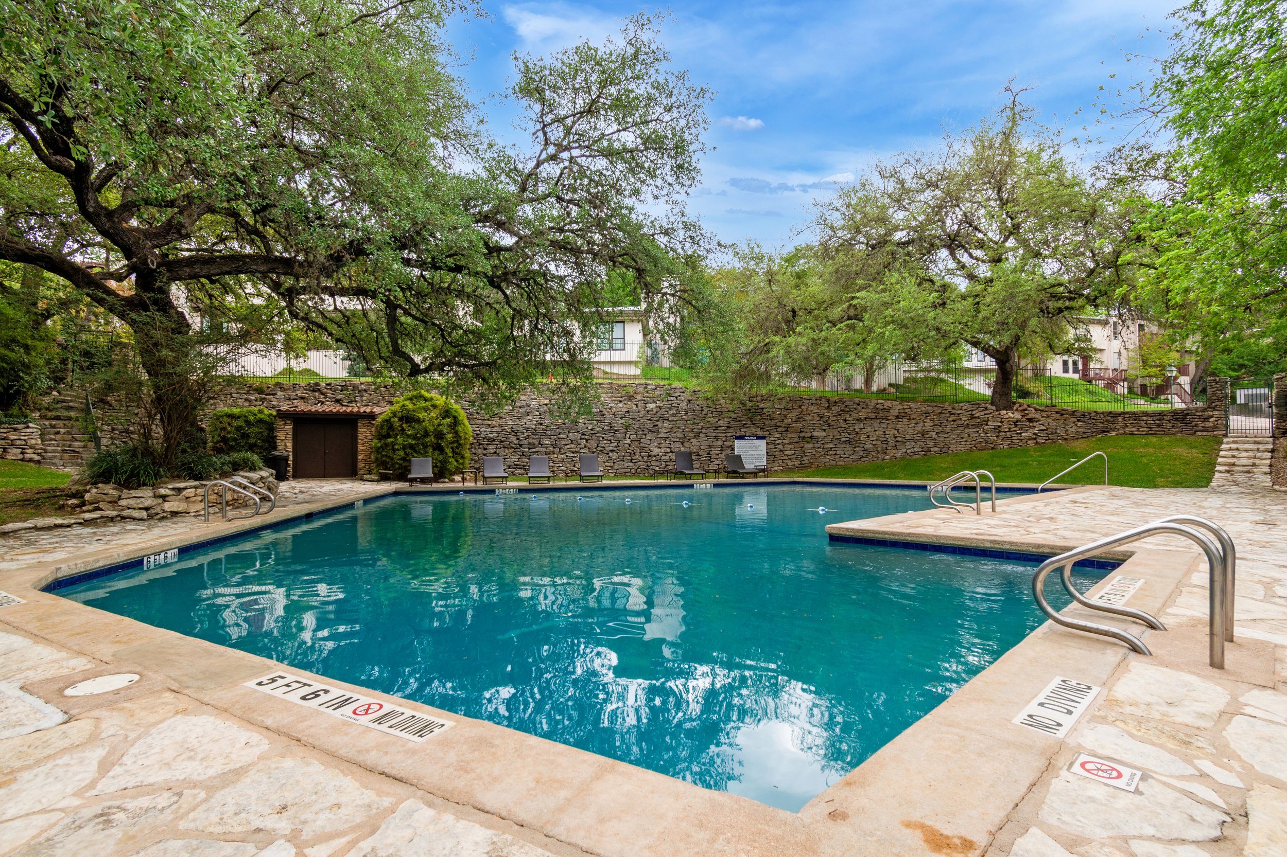 3601 Las Colinas Drive, Unit C Austin, TX 78731 - Photo 27 of 33 a view of a lake with a yard