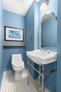 a bathroom with a sink and a toilet