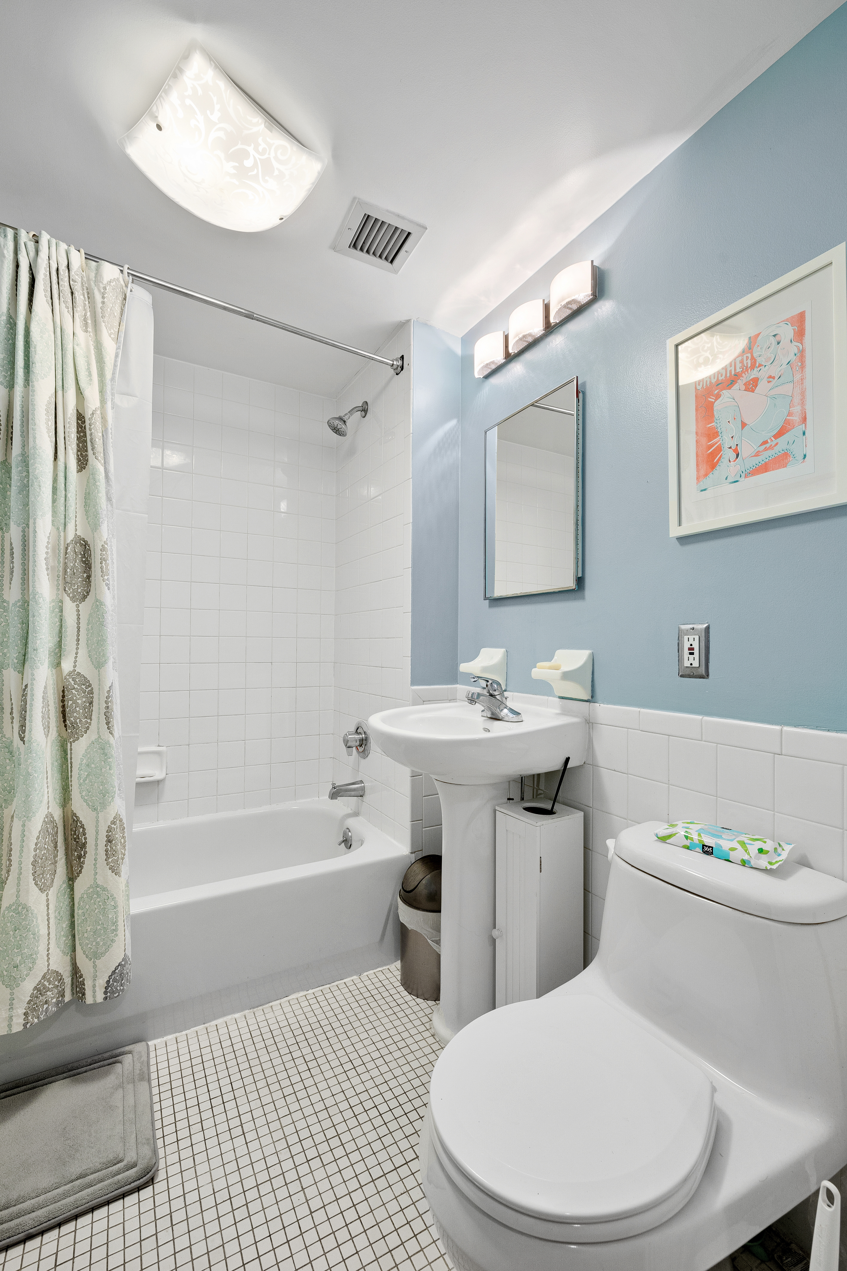 160 West 128th Street, Unit 1 Manhattan, NY 10027 - Photo 3 of 5 a bathroom with a sink a toilet and shower