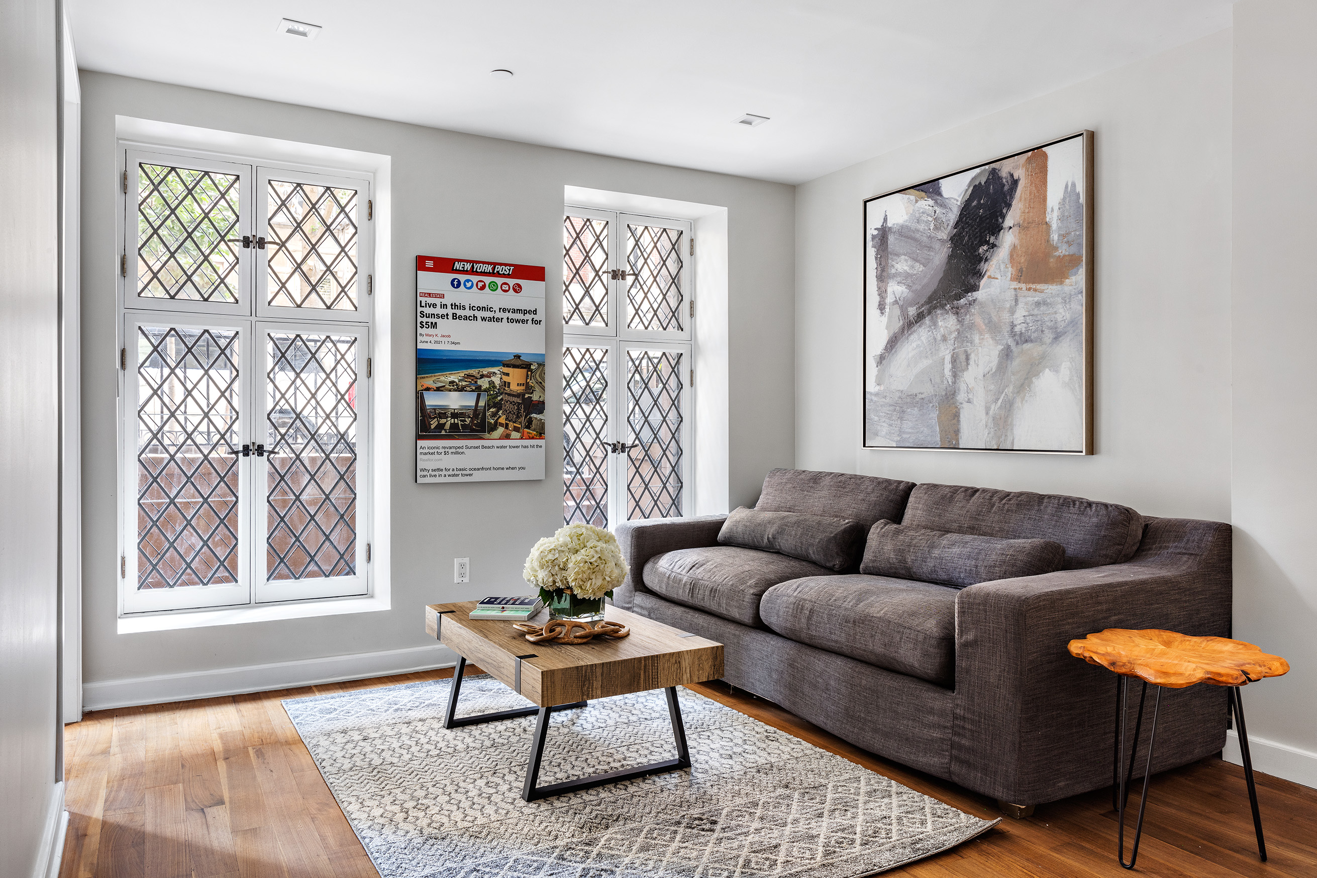 25 East 94th Street Manhattan, NY 10128 - Photo 32 of 33 a living room with furniture and a window