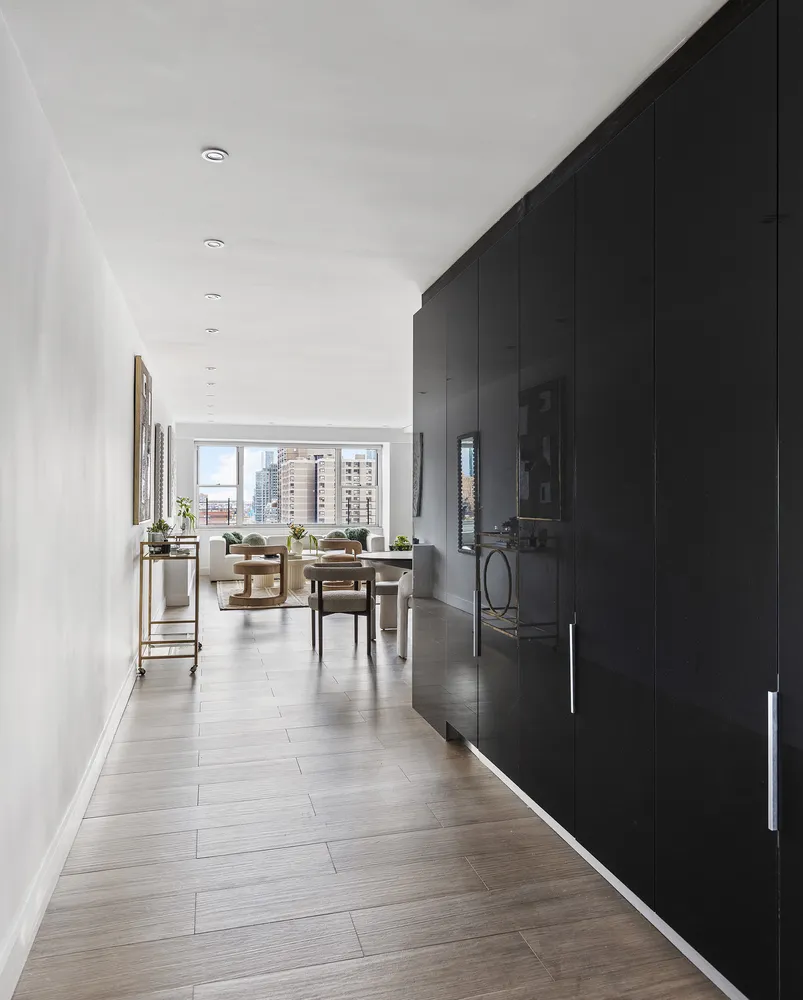 a view of dining room and hall with wooden floor