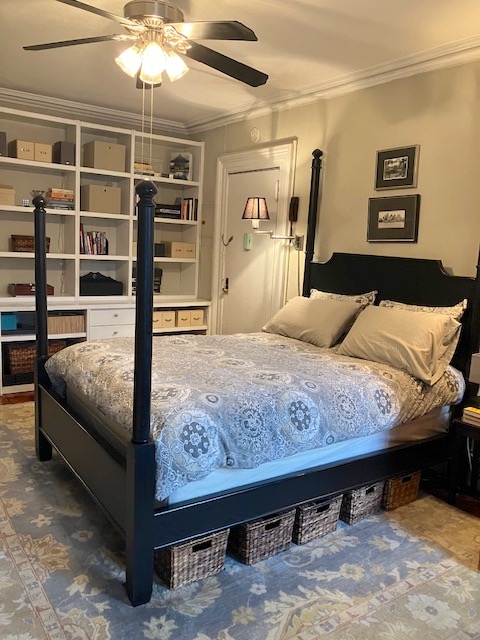 214 East 12th Street, Unit 4 Manhattan, NY 10003 - Photo 6 of 9 a bedroom with a bed and a chandelier