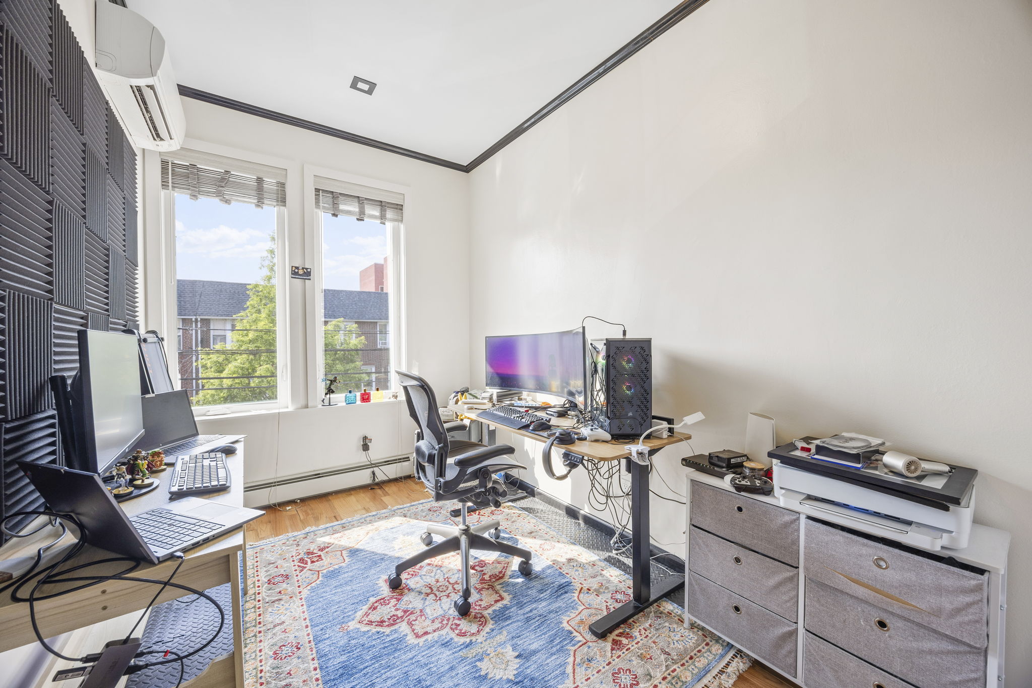 25-69 46th Street Queens, NY 11103 - Photo 14 of 33 a workspace with furniture hardwood and a window