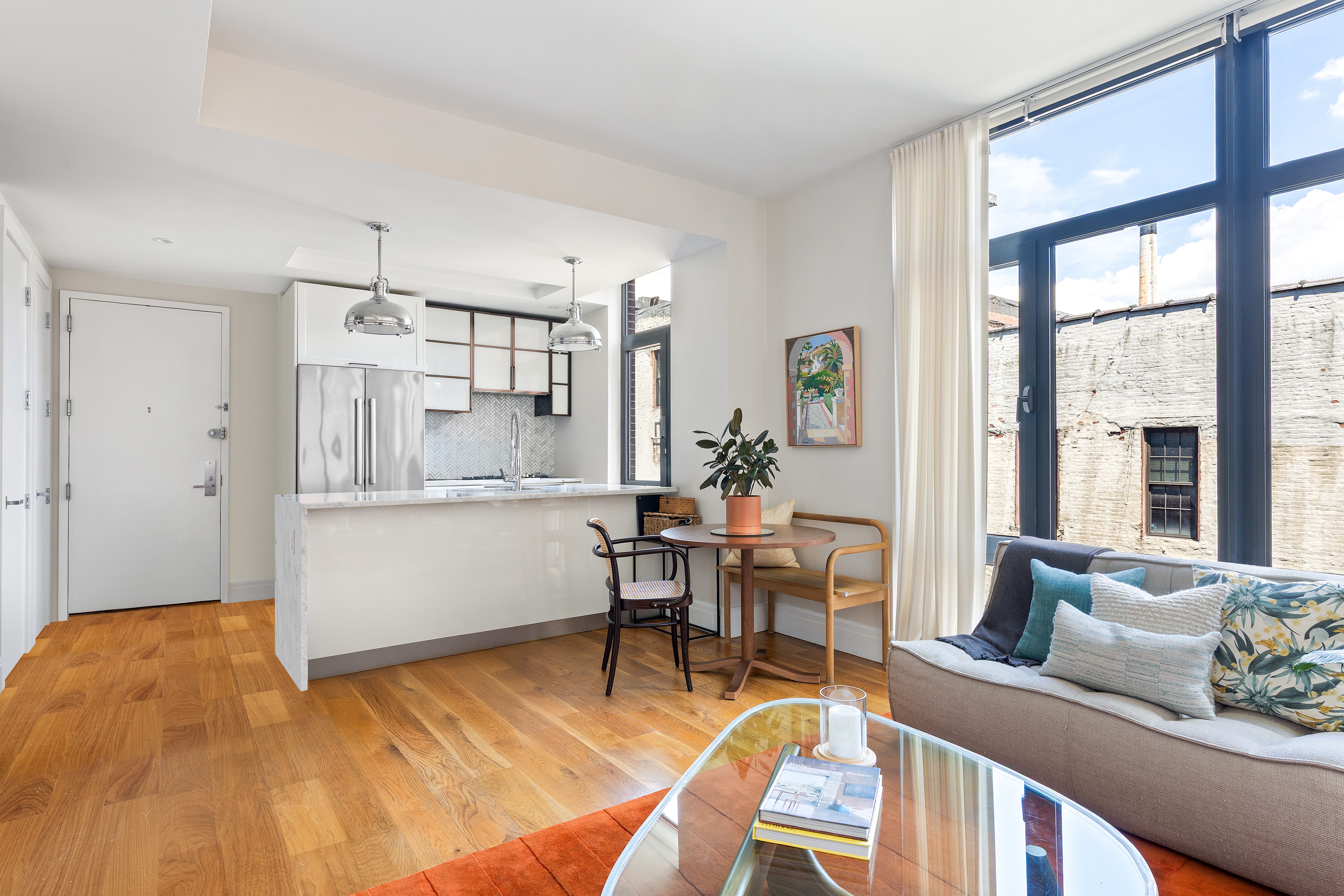 47 Bridge Street, Unit 5D Brooklyn, NY 11201 - Photo 3 of 21 a room with furniture and a table