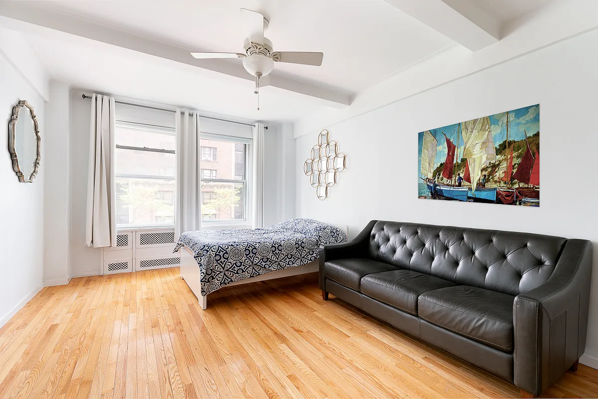 a living room with a couch and a couch