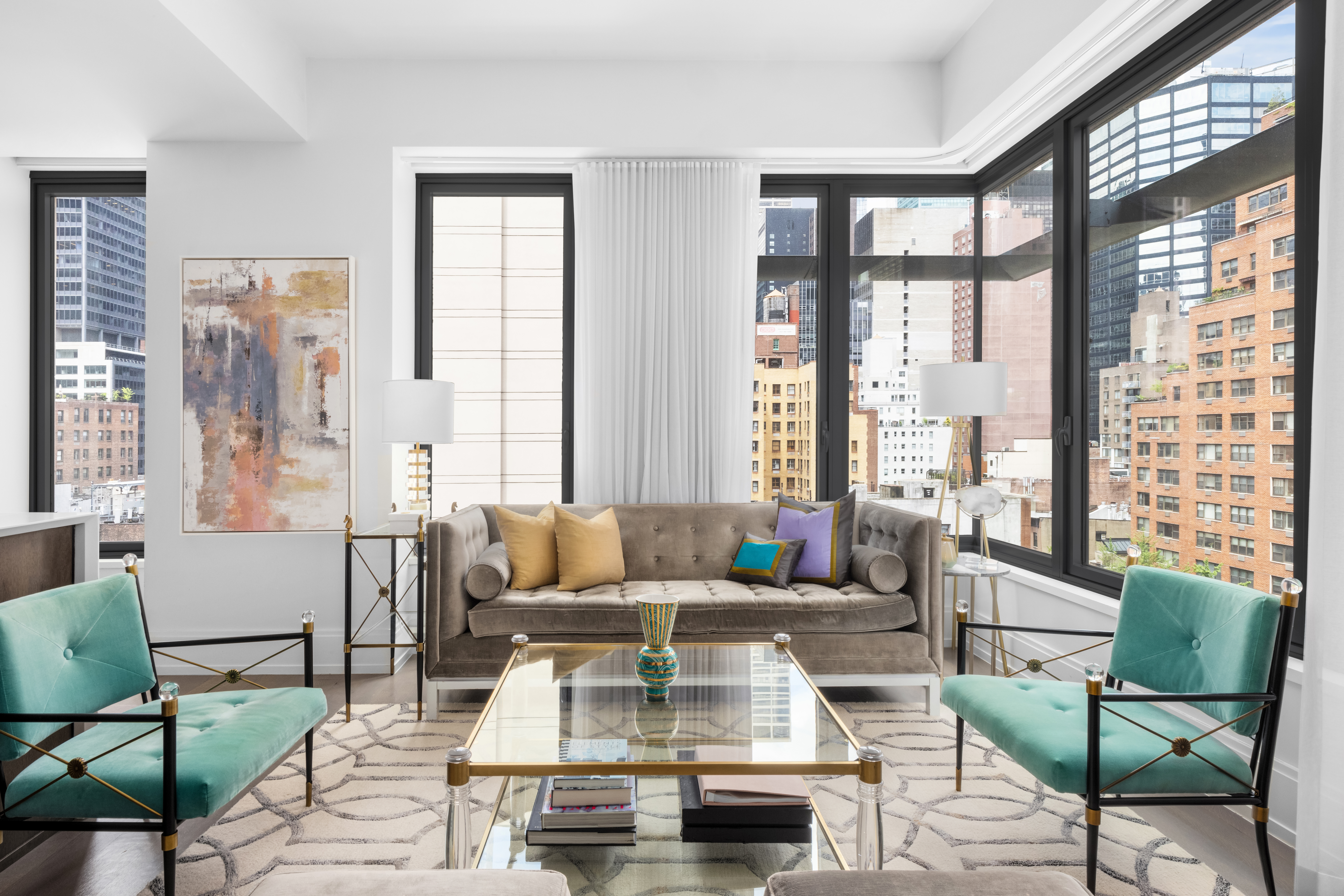 301 East 50th Street, Unit 8C Manhattan, NY 10022 - Photo 4 of 20 a living room with furniture and a large window