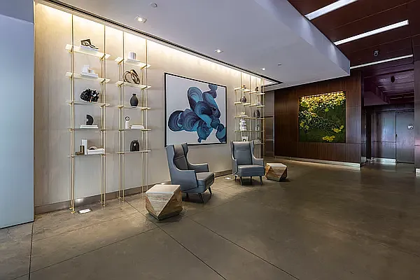 225 East 34th Street, Unit 14C Manhattan, NY 10016 - Photo 13 of 17 a view of a livingroom with furniture and windows