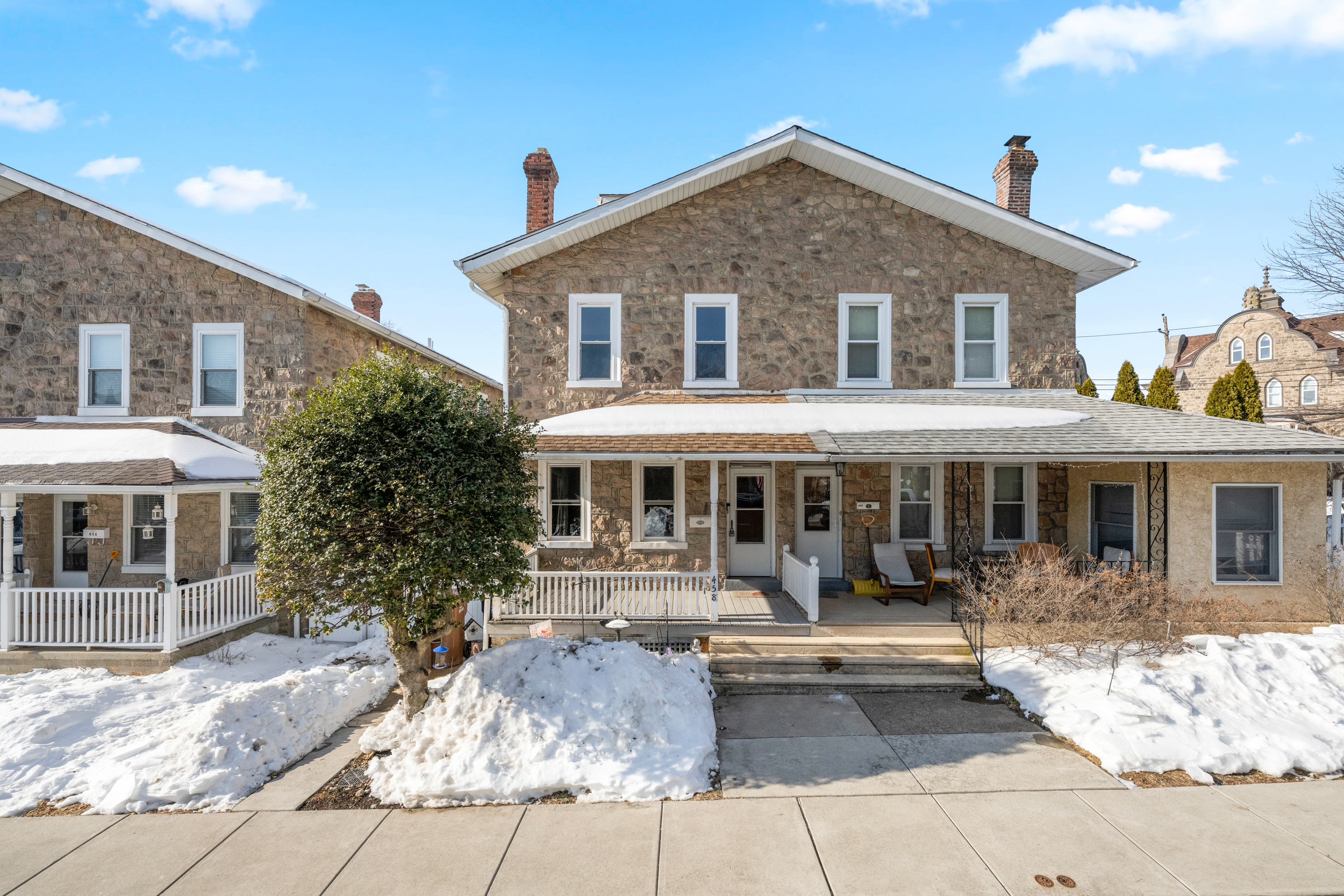 a front view of a house with porch