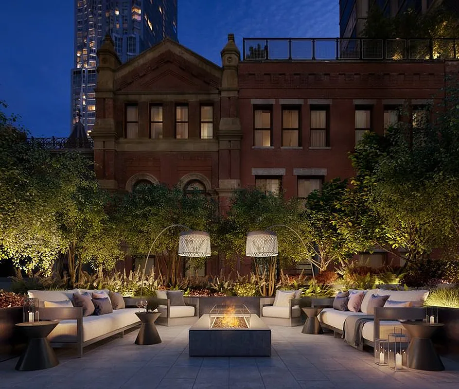 25 Park Row, Unit 11B Manhattan, NY 10038 - Photo 7 of 15 front view of a house with a street