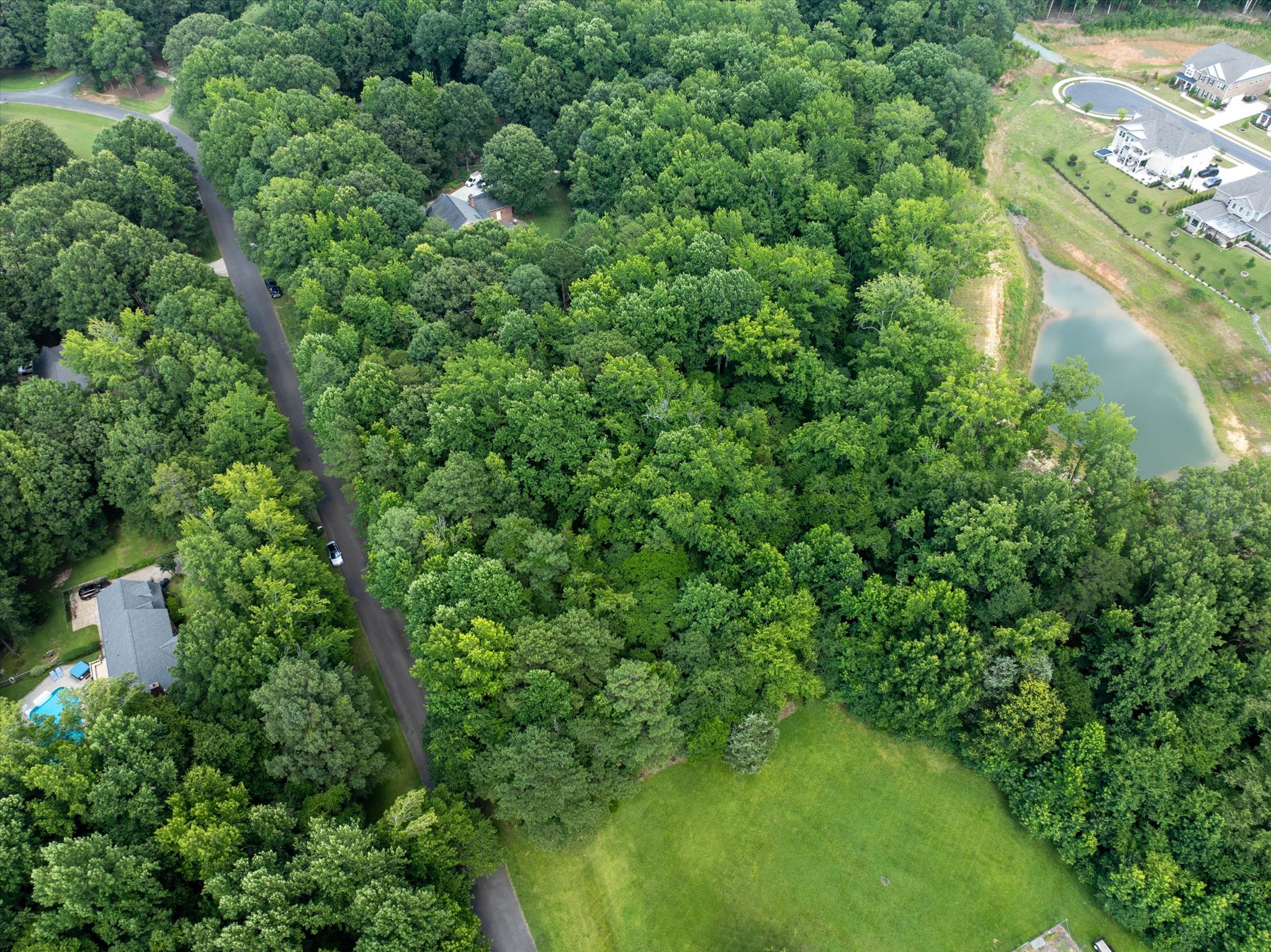 37 Willow Oaks Trail Weddington, NC 28104 - Photo 2 of 5 an aerial view of residential houses with outdoor space and trees
