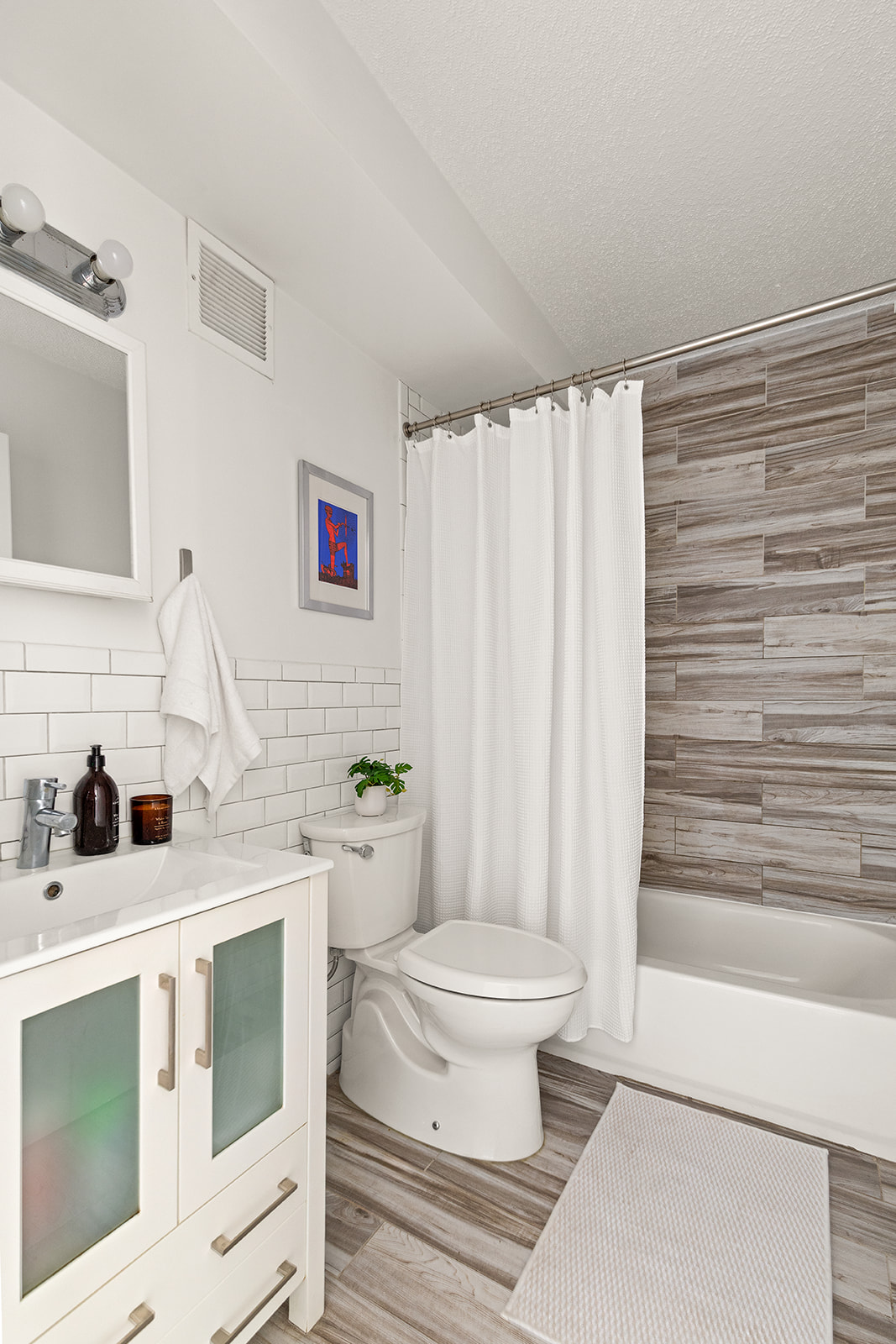 119 Suydam Street Brooklyn, NY 11221 - Photo 5 of 16 a bathroom with a sink a toilet and shower