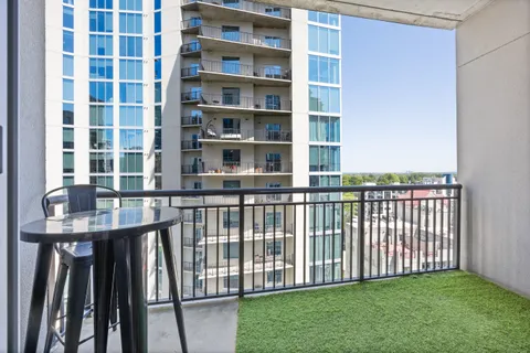 a view of a balcony with an ocean view