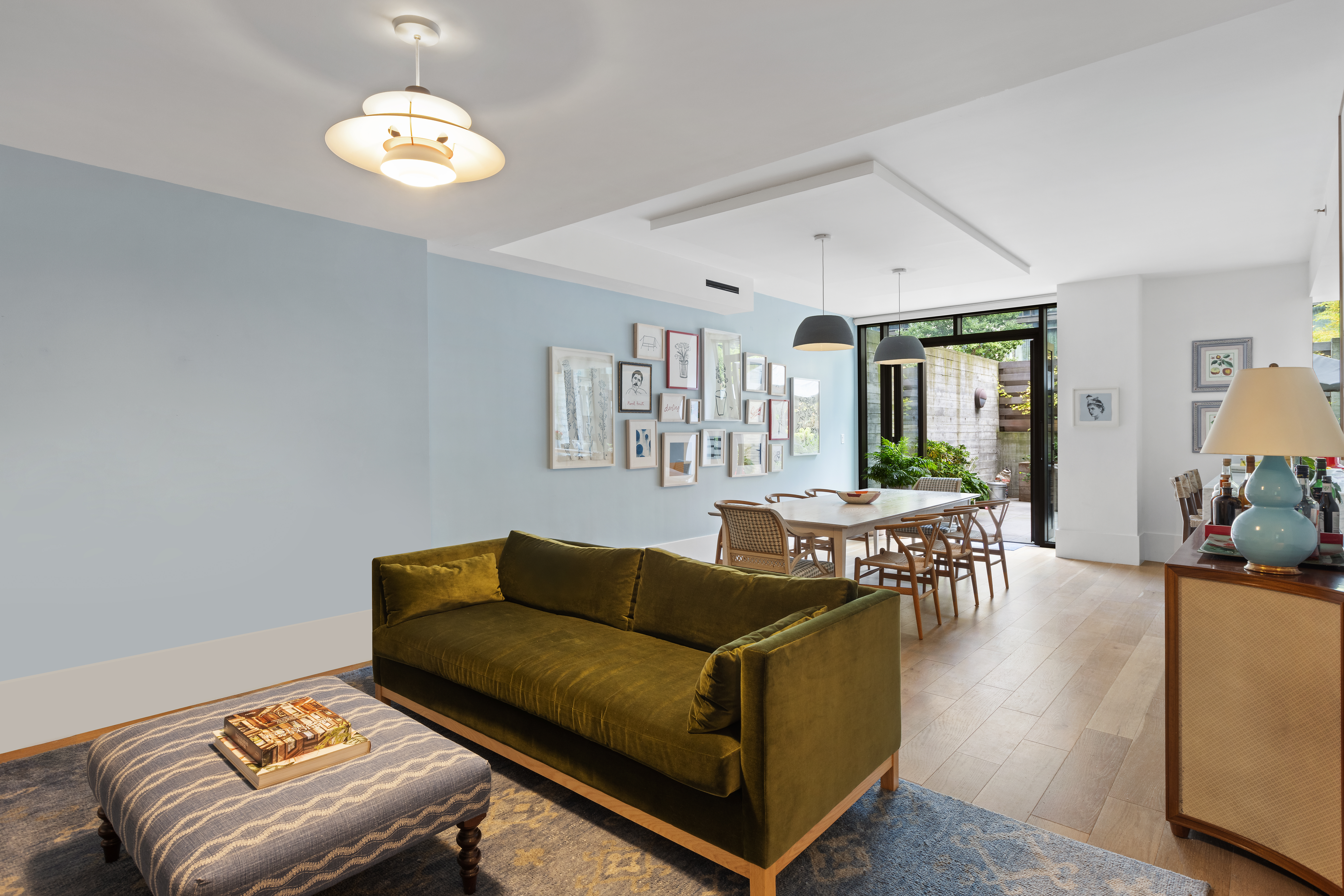 429 Kent Avenue, Unit TH2 Brooklyn, NY 11249 - Photo 14 of 34 a living room with furniture and a wooden floor