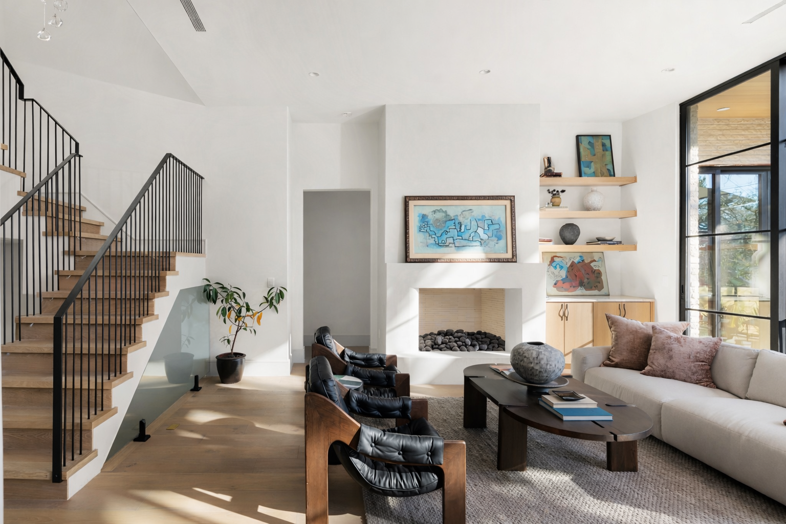 3411 Bridle Path Austin, TX 78703 - Photo 12 of 76 a living room with furniture potted plant and a fireplace
