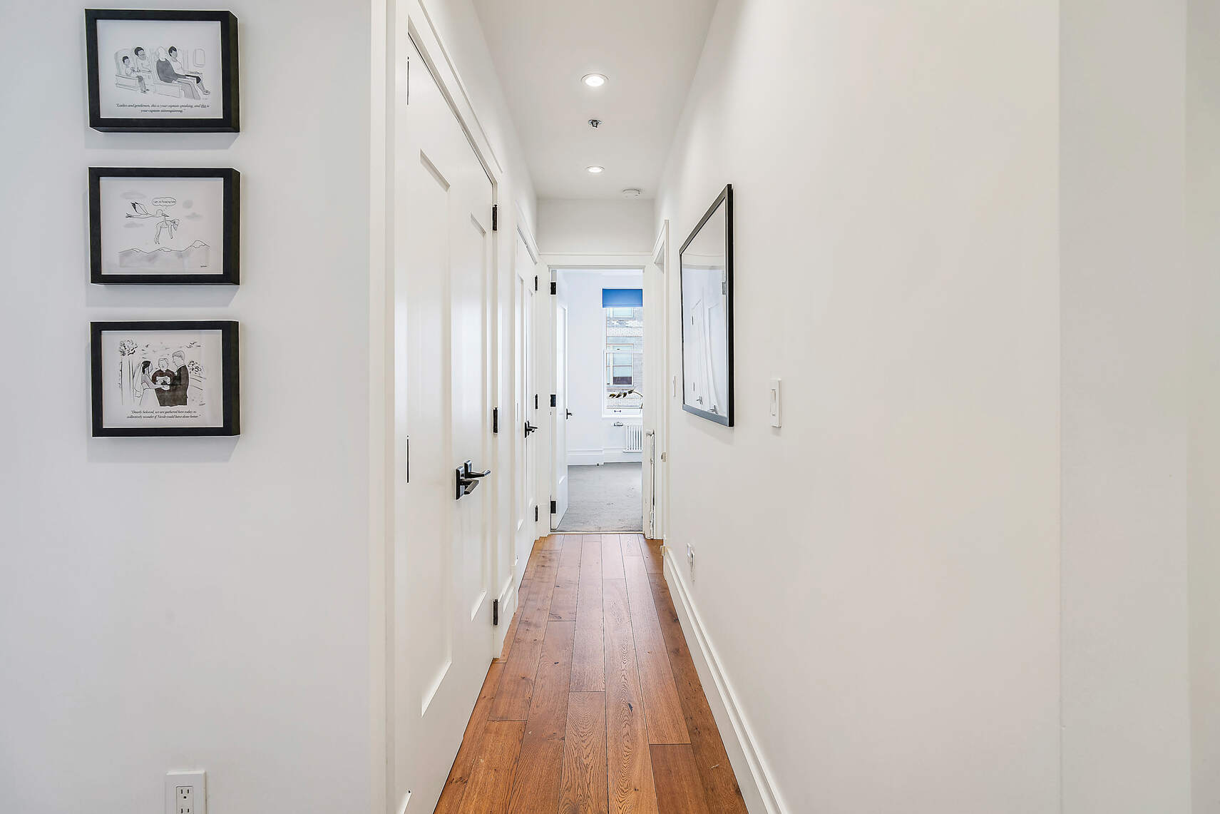 60 Pineapple Street, Unit 7I Brooklyn, NY 11201 - Photo 7 of 14 a view of a hallway with wooden floor and closet