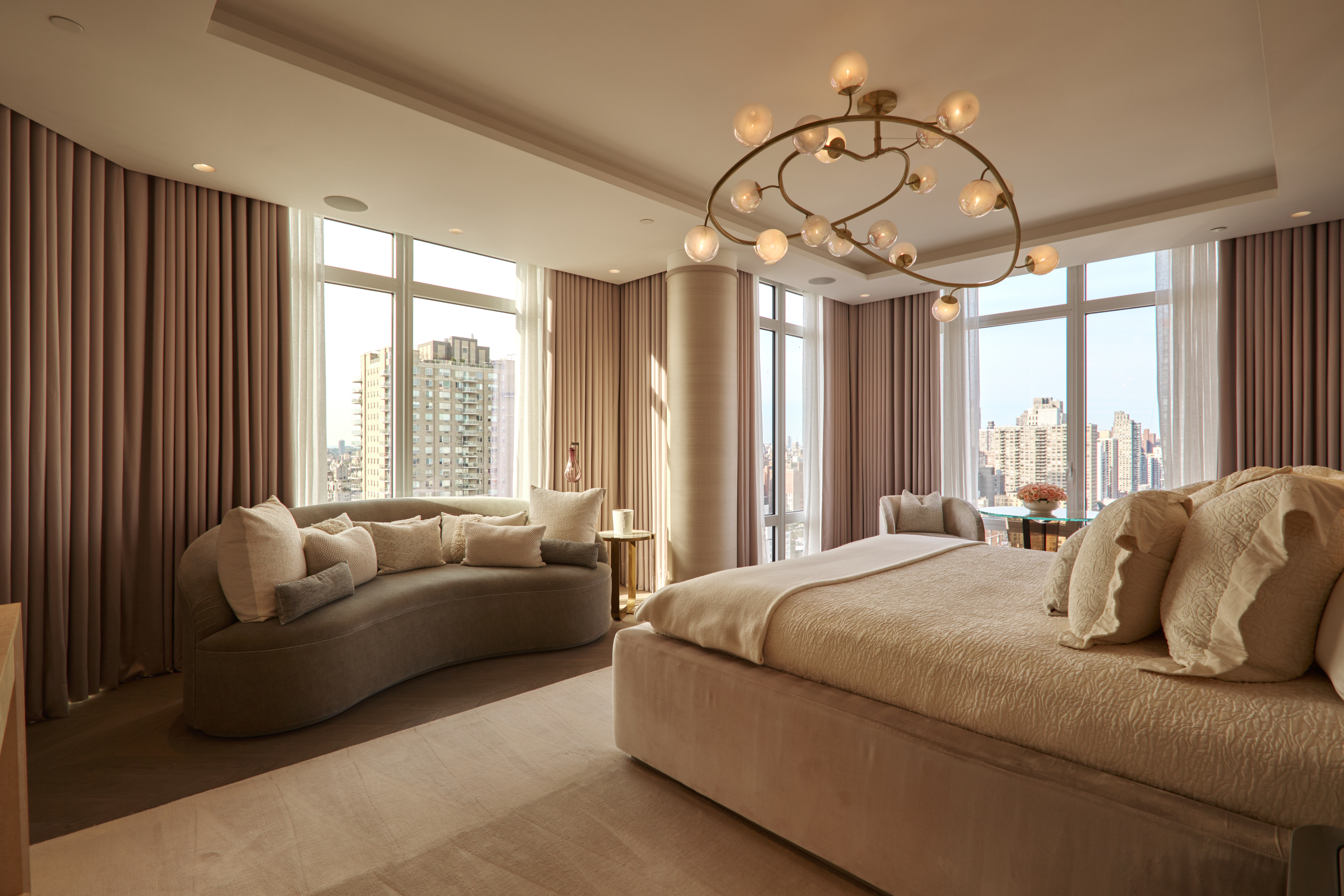 1355 1st Avenue, Unit PH2 Manhattan, NY 10021 - Photo 11 of 28 a bedroom with bed and a chandelier