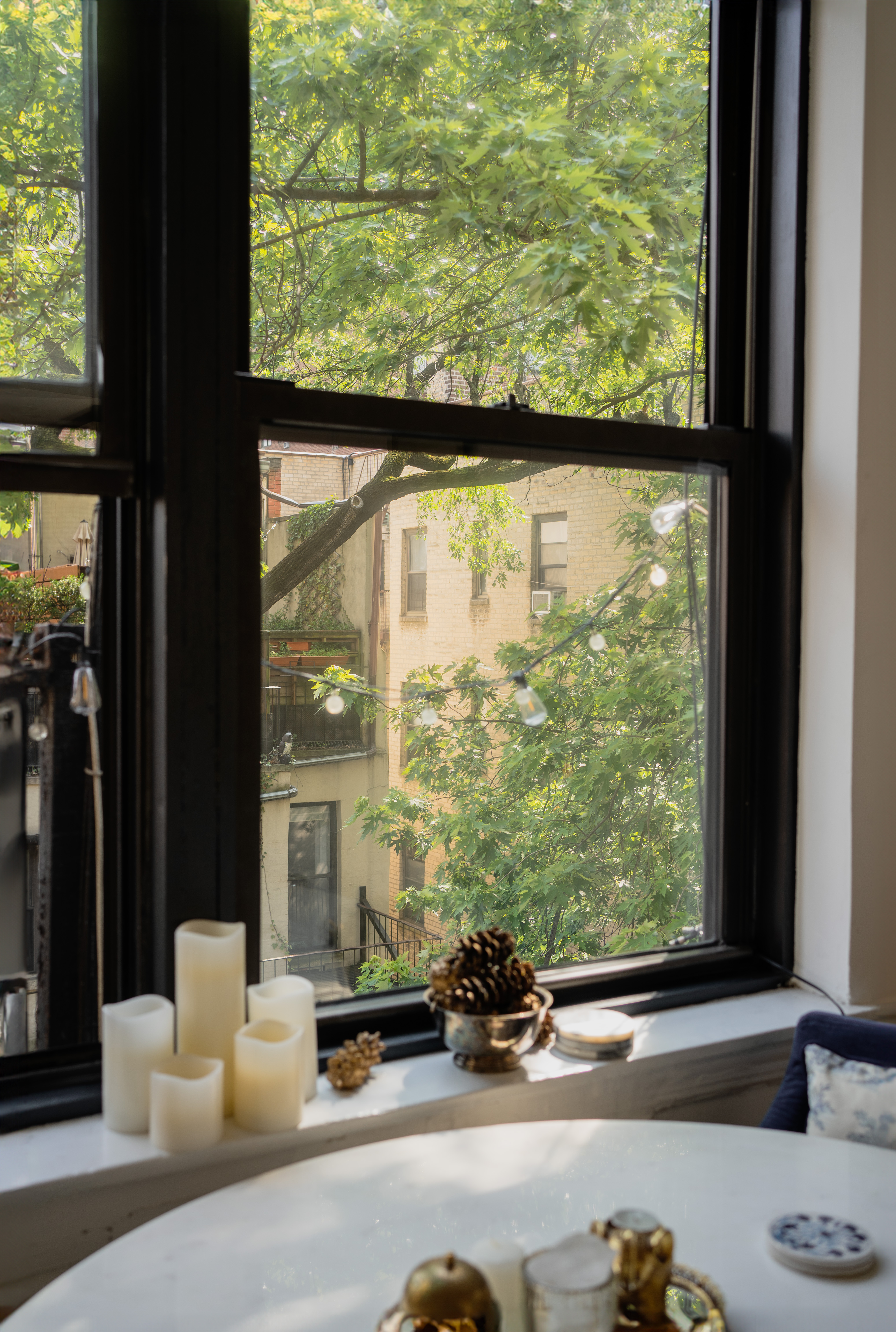 512 East 83rd Street, Unit D4 Manhattan, NY 10028 - Photo 4 of 21 a living room with large windows