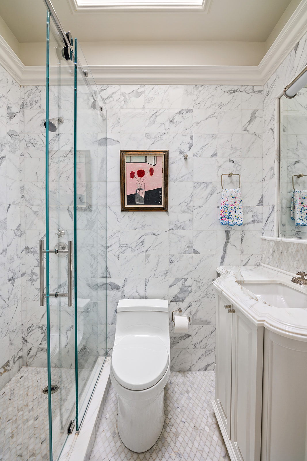 164 East 72nd Street, Unit PHC Manhattan, NY 10021 - Photo 11 of 17 a bathroom with a toilet sink and shower