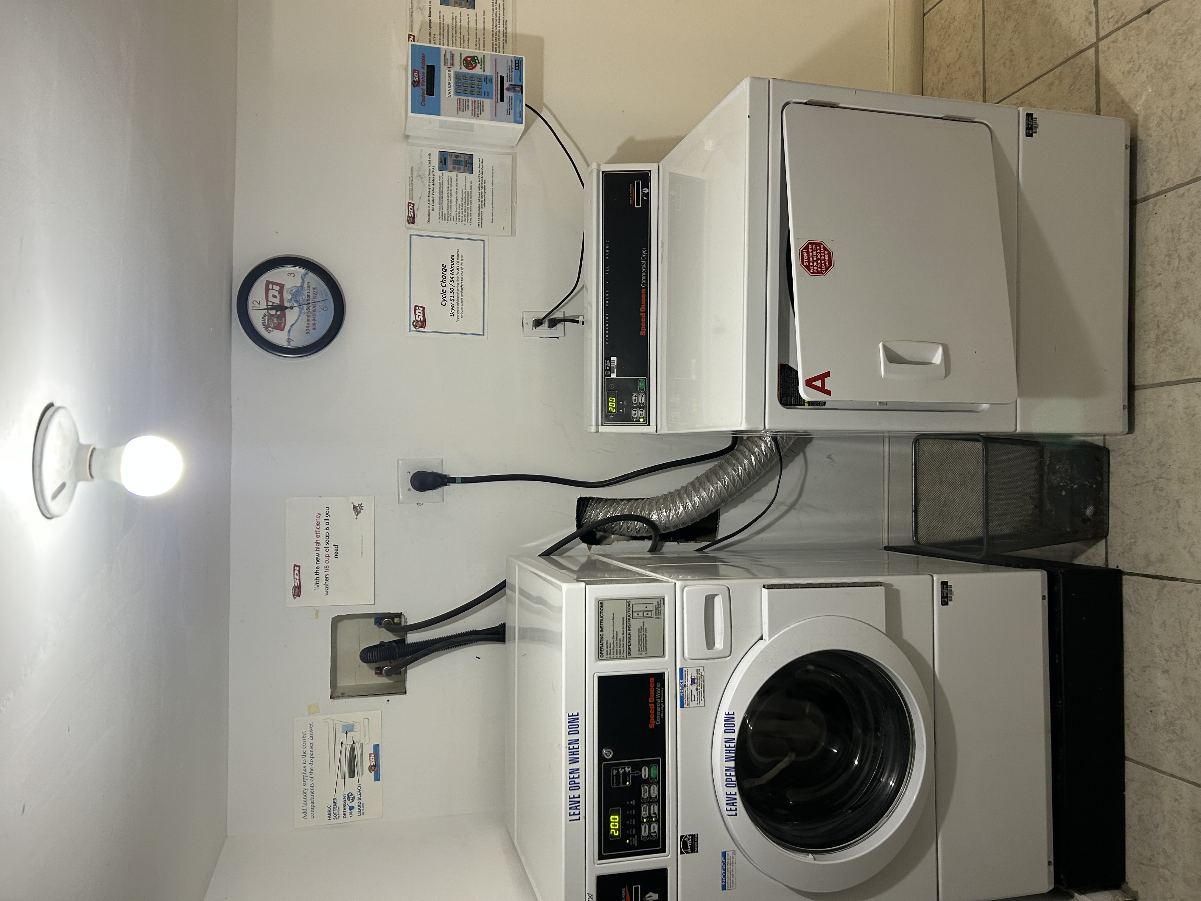 201 Huron Street, Unit 4F Brooklyn, NY 11222 - Photo 10 of 12 a utility room with dryer and washer