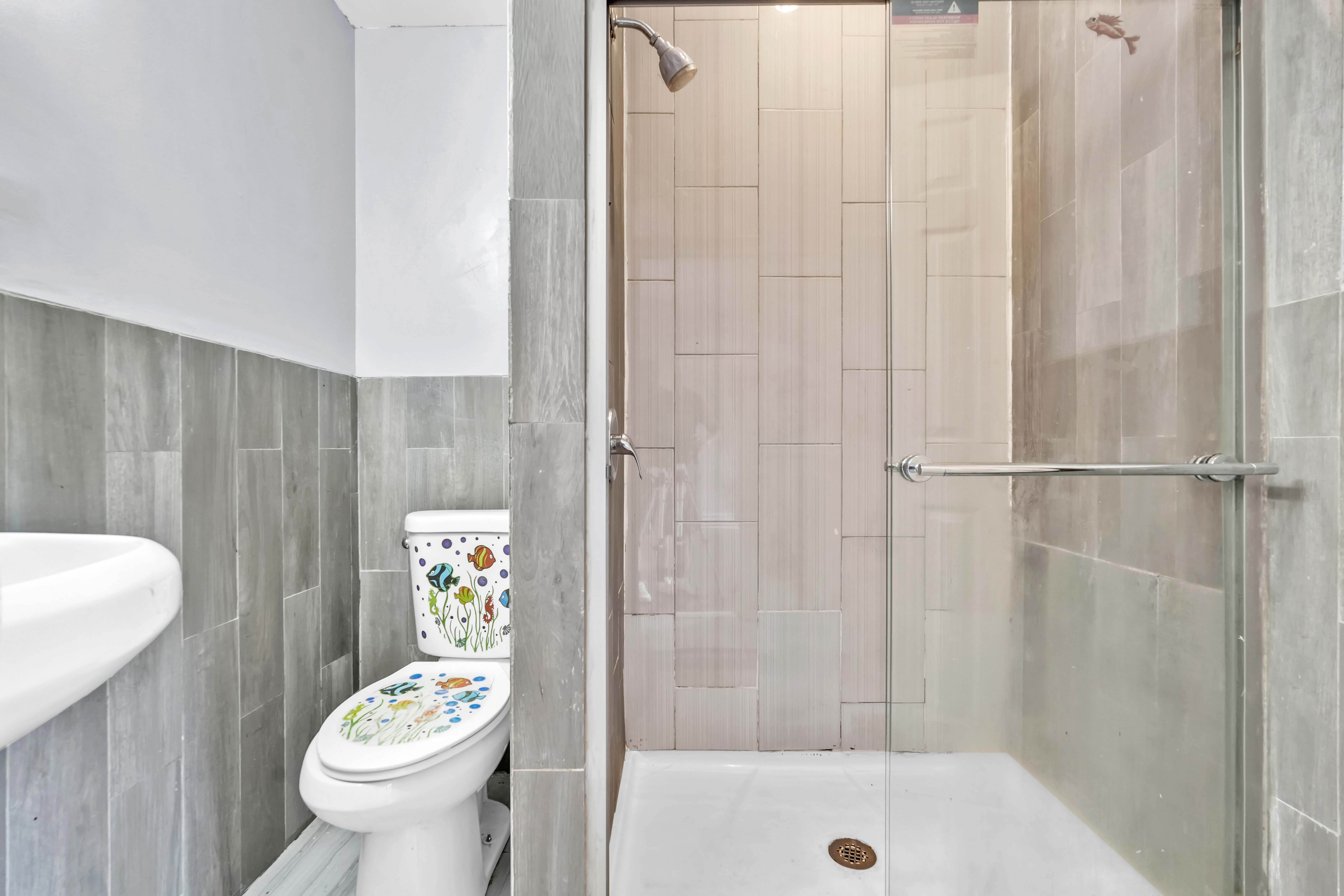 1633 St Johns Place, Unit 3 Brooklyn, NY 11233 - Photo 13 of 29 a bathroom with a sink toilet and shower