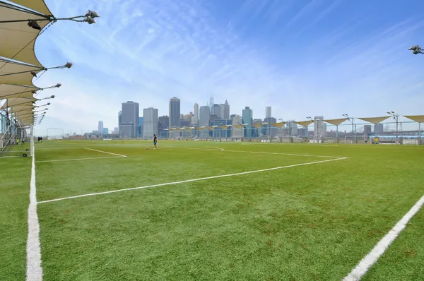 a view of a city street with a house