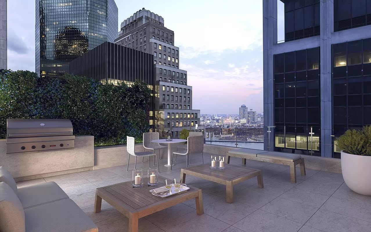 101 Wall Street, Unit 5BE Manhattan, NY 10005 - Photo 14 of 16 a view of table and chairs in patio