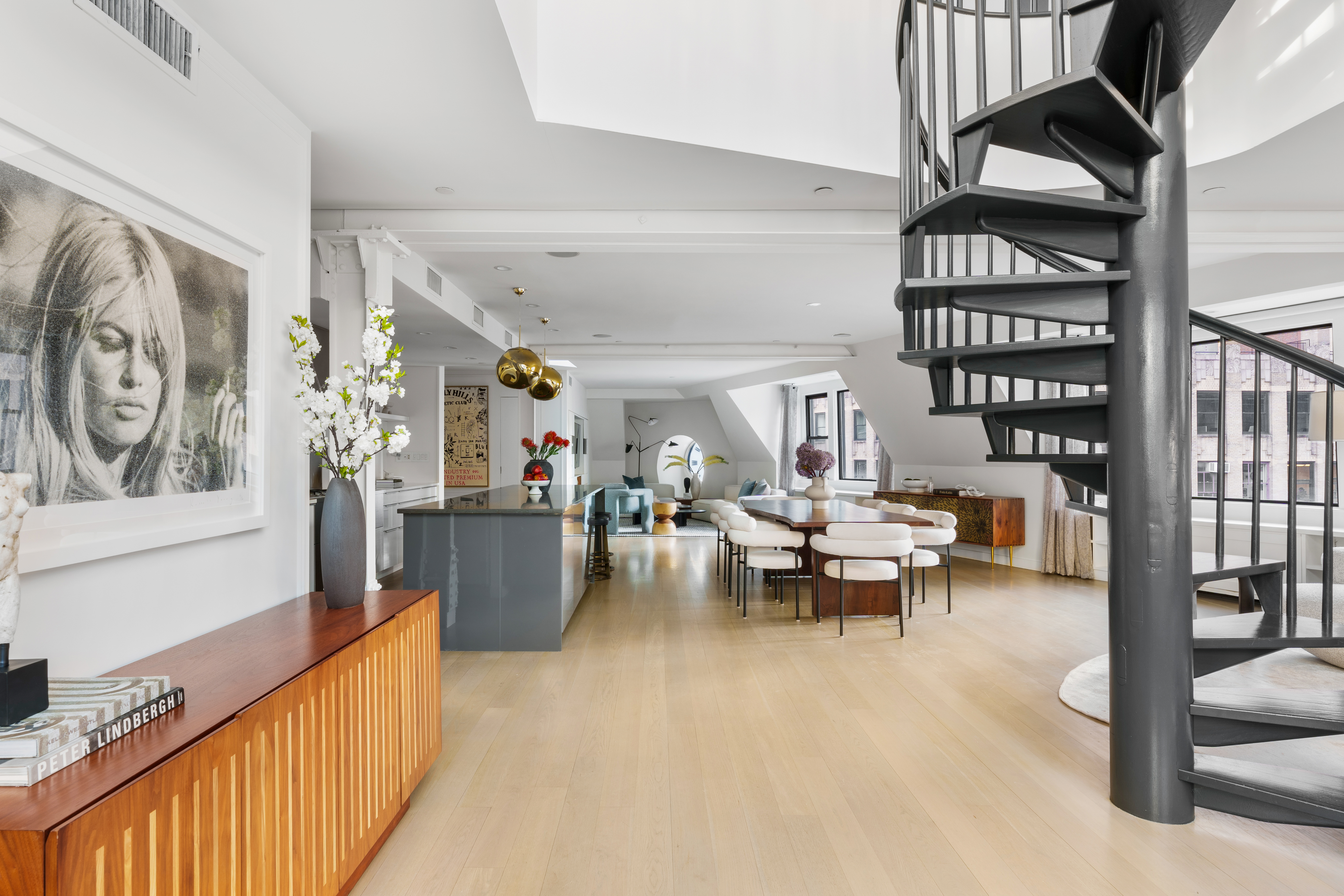 1200 Broadway, Unit PH89 Manhattan, NY 10001 - Photo 9 of 47 a living room with furniture and wooden floor