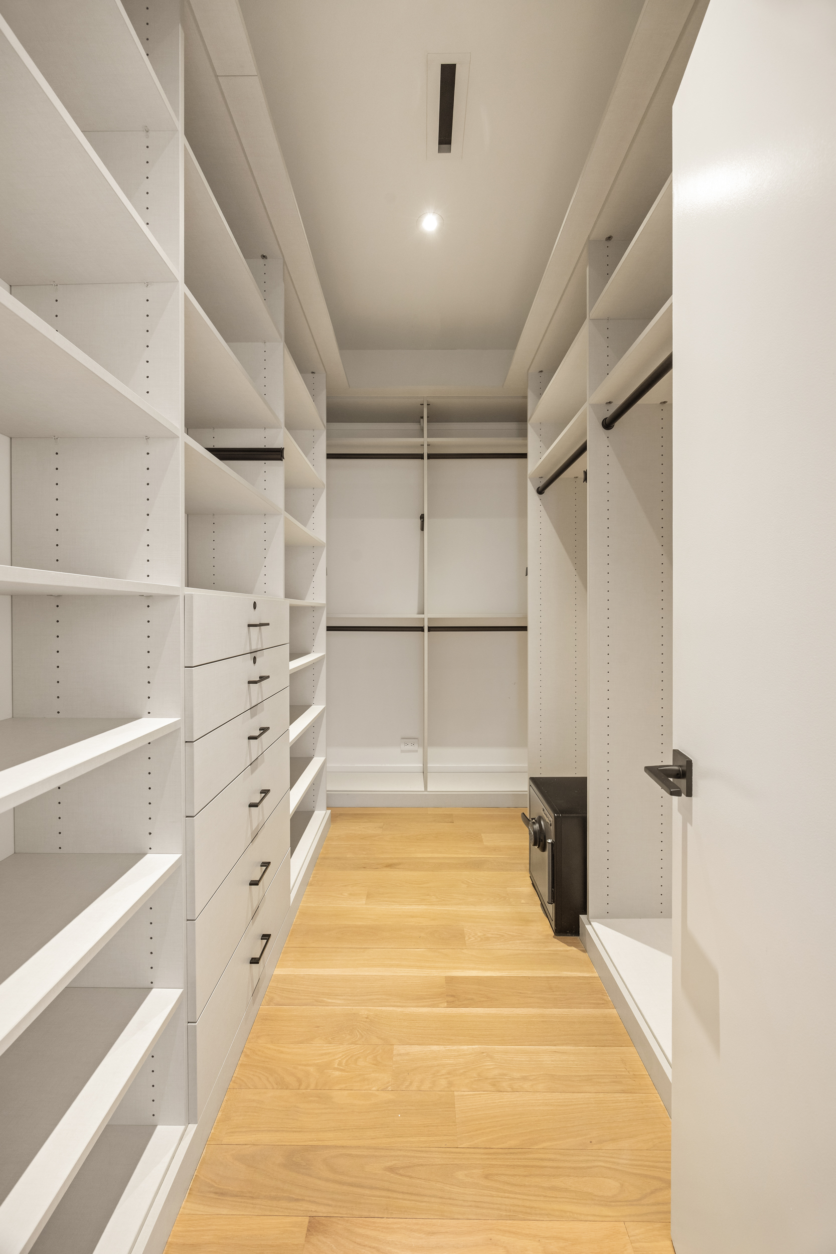 45 Warren Street, Unit PH Manhattan, NY 10007 - Photo 15 of 29 a room with a bed and a walk in closet