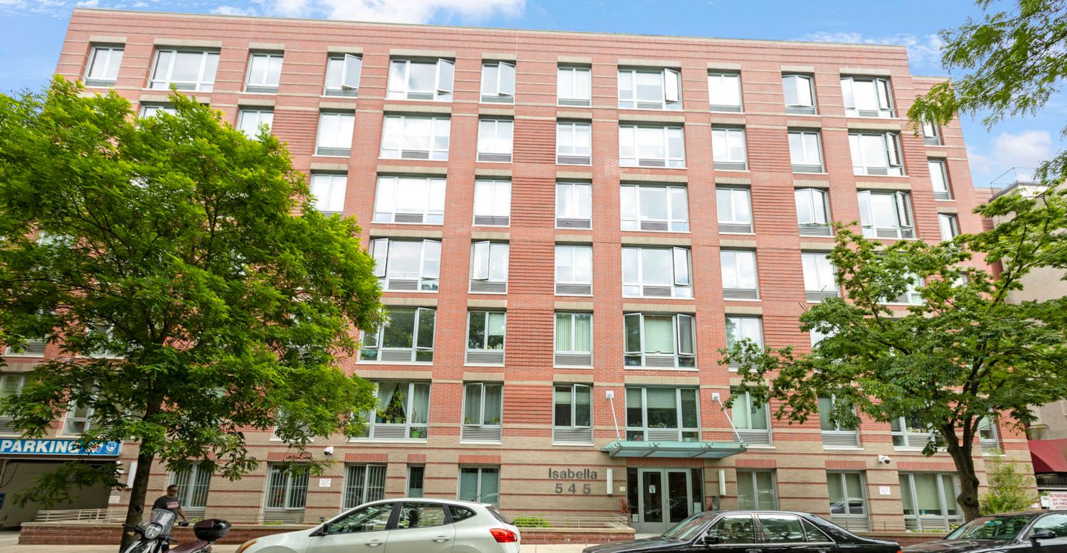 545 Washington Avenue, Unit 604 Brooklyn, NY 11238 - Photo 14 of 16 a front view of a residential apartment building with a yard