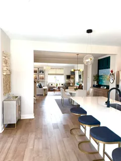 a lobby with furniture and a large window